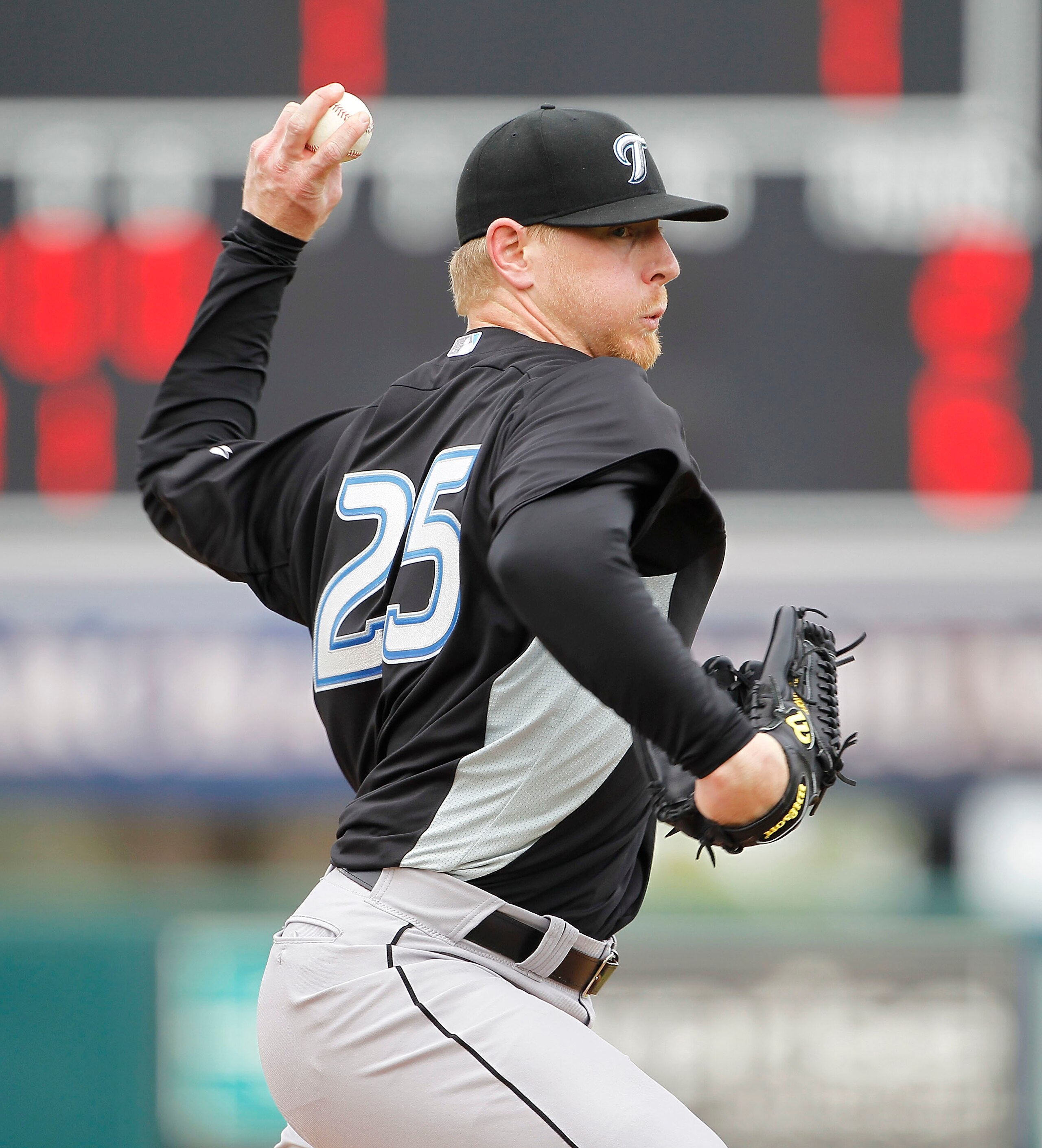 LAKELAND, FL - MARCH 01: David Purcey #25 of the Toronto Blue Jays pitches during the game against the Detroit Tigers at Joker Marchant Stadium on March 1, 2011 in Lakeland, Florida. The Tigers defeated the Blue Jays 6-2.  (Photo by Leon Halip/Getty Image