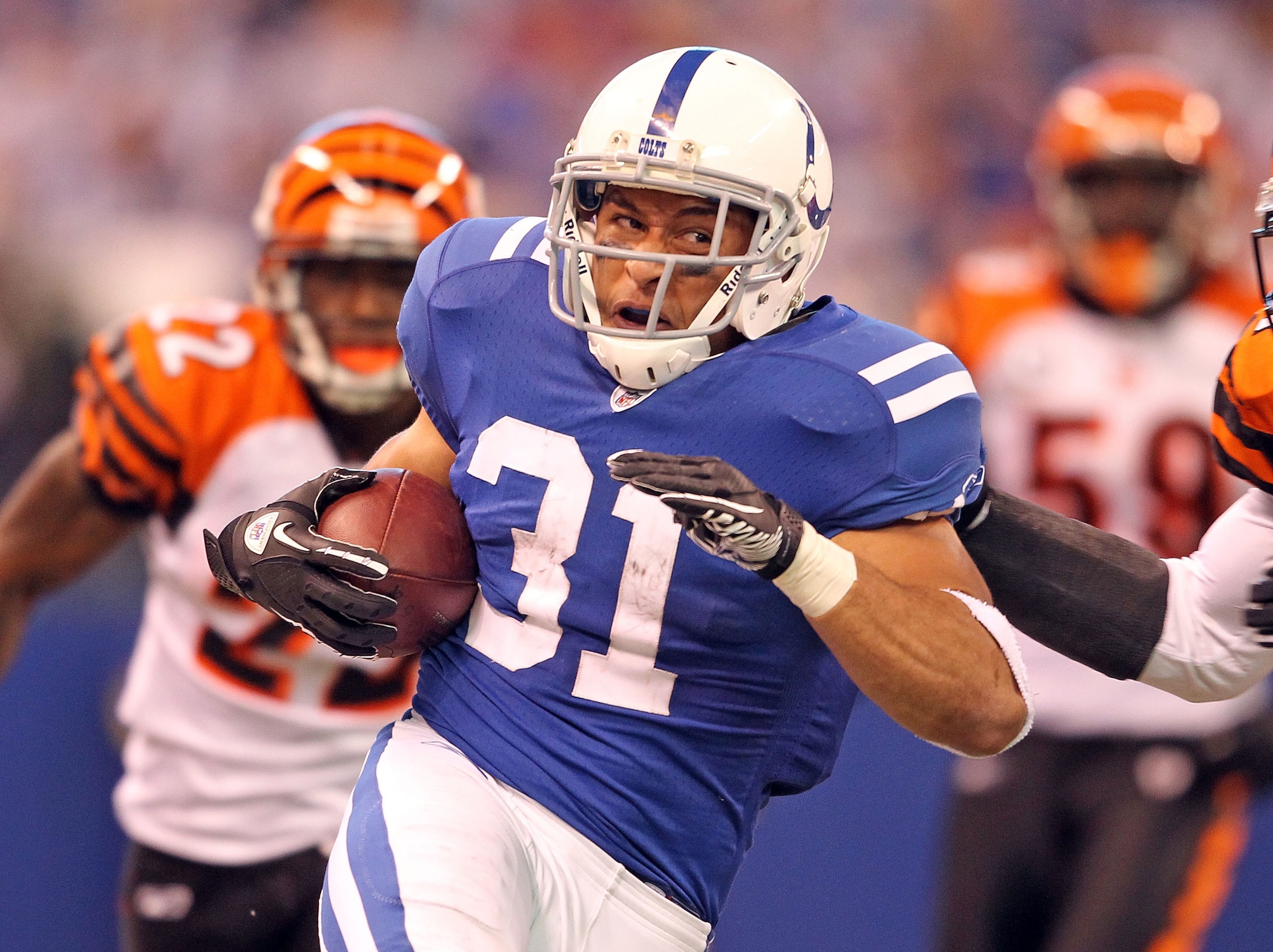 INDIANAPOLIS - NOVEMBER 14:  Donald Brown #31 of the Indianapolis Colts runs with the ball during the NFL game against the Cincinnati Bengals at Lucas Oil Stadium on November 14, 2010 in Indianapolis, Indiana. The Colts won 23-17.  (Photo by Andy Lyons/Ge