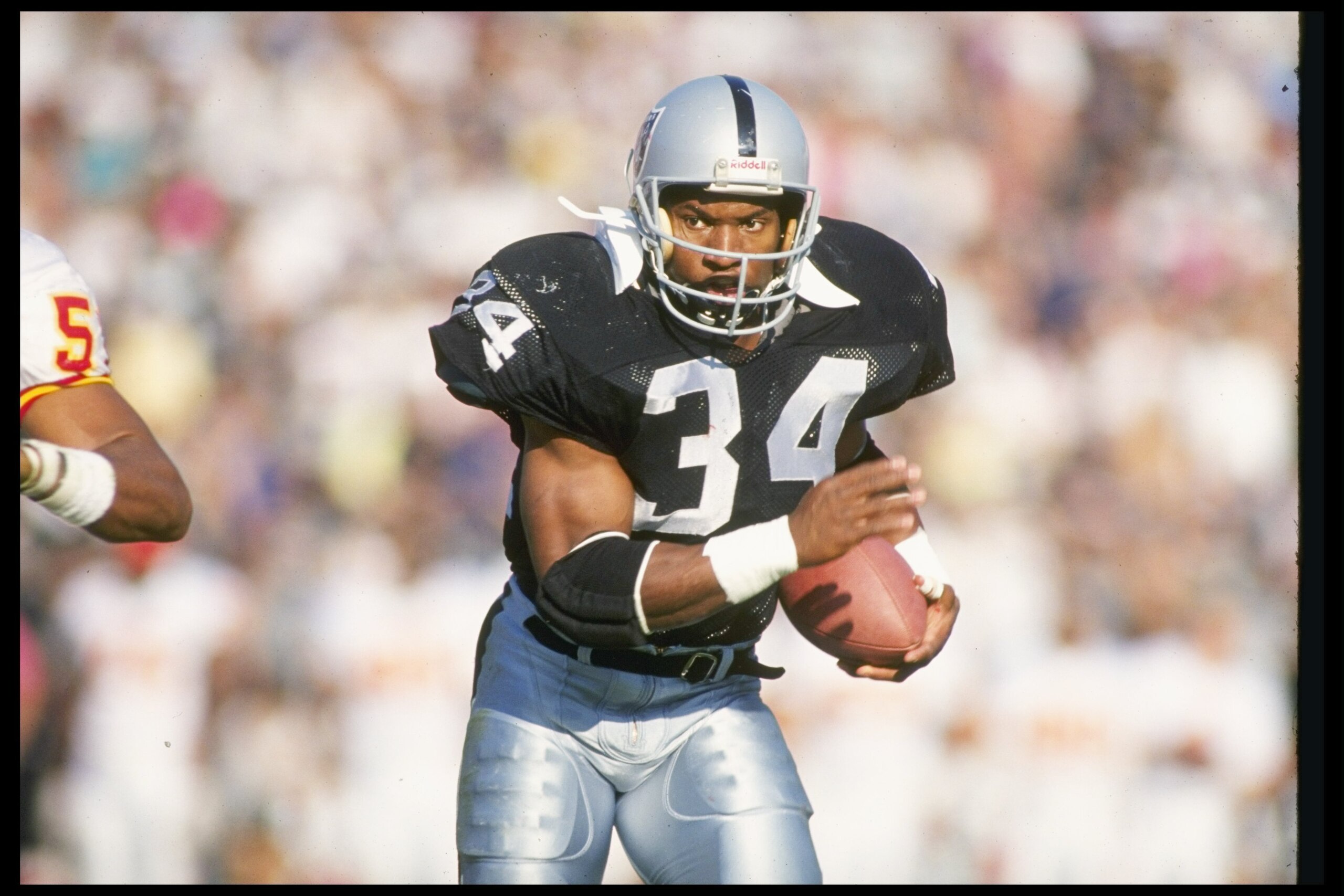 25 Nov 1990: Running back Bo Jackson of the Los Angeles Raiders moves the ball during a game against the Kansas City Chiefs at the Los Angeles Memorial Coliseum in Los Angeles, California. The Chiefs won the game, 27-24. 25 Nov 1990: Running back Bo Jackson of the Los Angeles Raiders moves the ball during a game against the Kansas City Chiefs at the Los Angeles Memorial Coliseum in Los Angeles, California. The Chiefs won the game, 27-24.