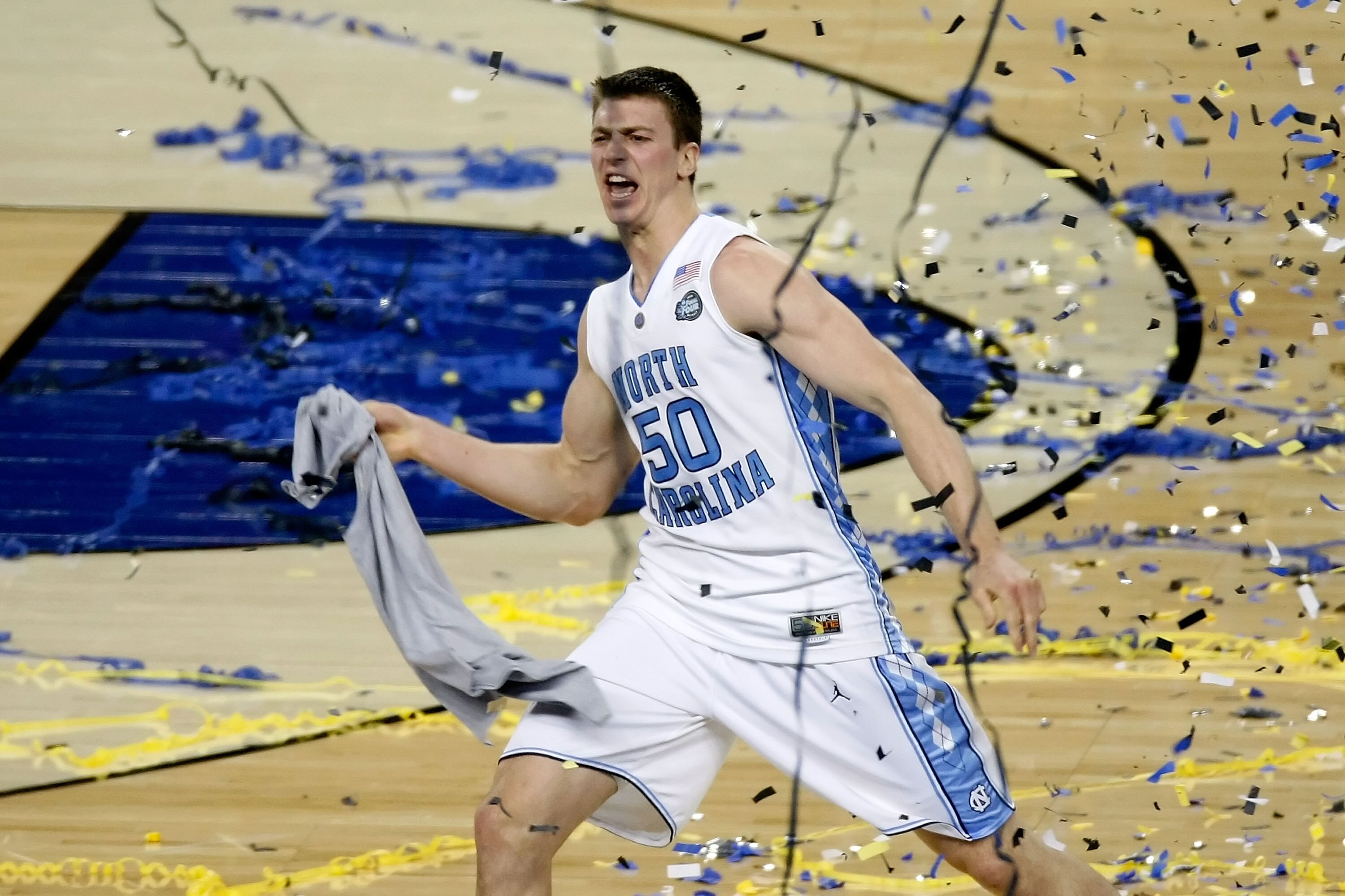 DETROIT - APRIL 06:  Tyler Hansbrough #50 of the North Carolina Tar Heels celebrates with his teammates after they won 89-72 against the Michigan State Spartans during the 2009 NCAA Division I Men's Basketball National Championship game at Ford Field on A
