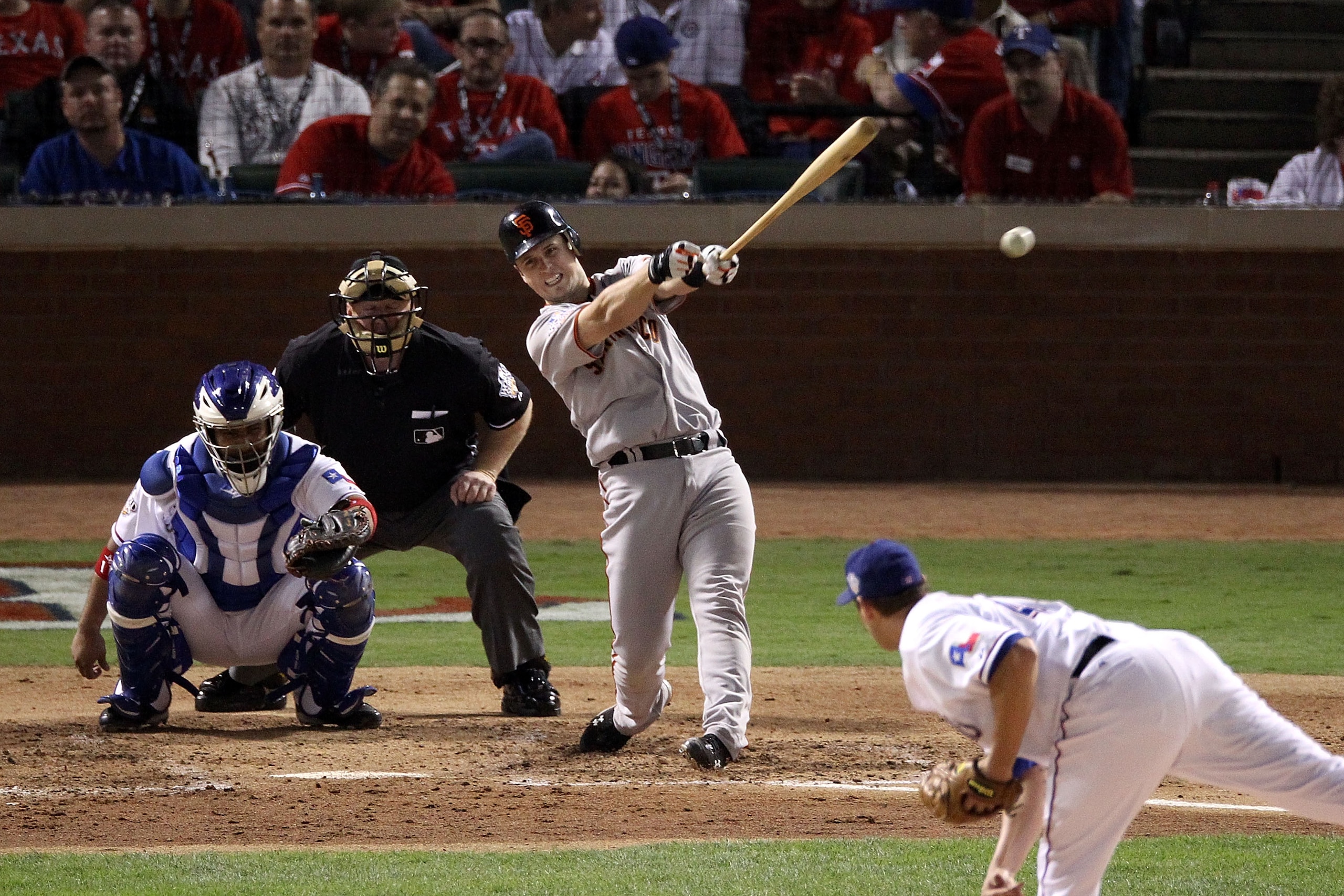 ARLINGTON, TX - OCTOBER 30:  Buster Posey #28 of the San Francisco Giants hits a single in the bottom of fourth inning against the Texas Rangers in Game Three of the 2010 MLB World Series at Rangers Ballpark in Arlington on October 30, 2010 in Arlington, 