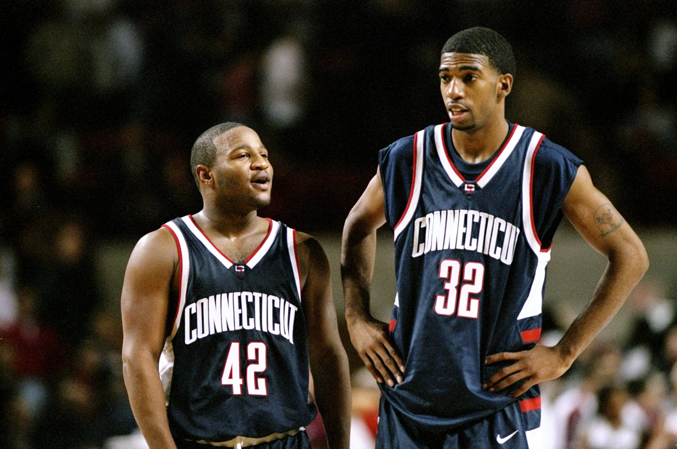 9 Dec 1998:  Guard Khalid El-Amin #42 and guard/forward Richard Hamilton #32 of the UConn Huskies confer during the game against the UMass Minutemen at Mullins Center in Amherst, Massachusetts. UConn defeated UMass 59-54. Mandatory Credit: Ezra O. Shaw  /