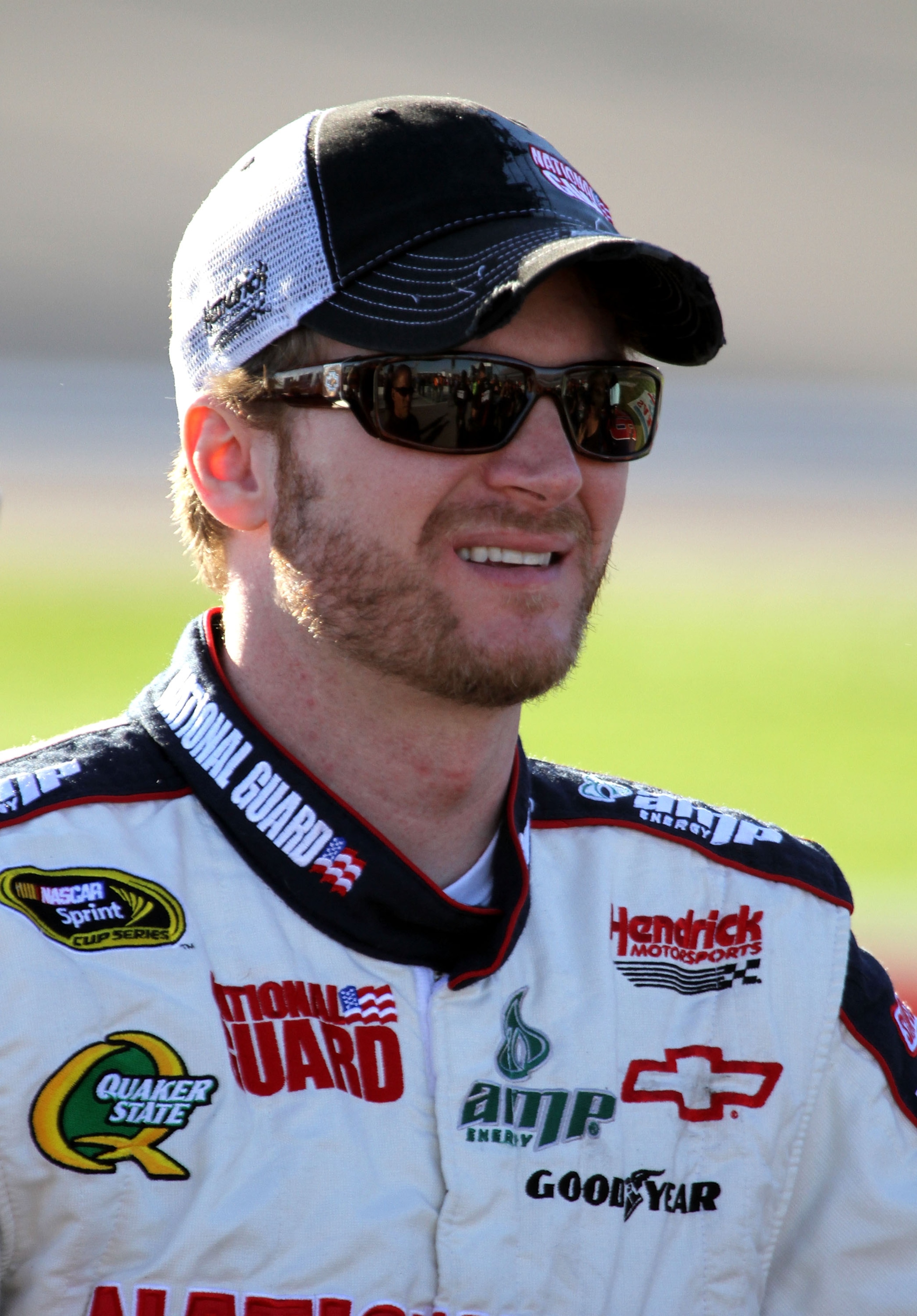 LAS VEGAS, NV - MARCH 04:  Dale Earnhardt Jr., driver of the #88 National Guard/Amp Energy Chevrolet, stands on the grid during qualifying for the NASCAR Sprint Cup Series Kobalt Tools 400 at Las Vegas Motor Speedway on March 4, 2011 in Las Vegas, Nevada.