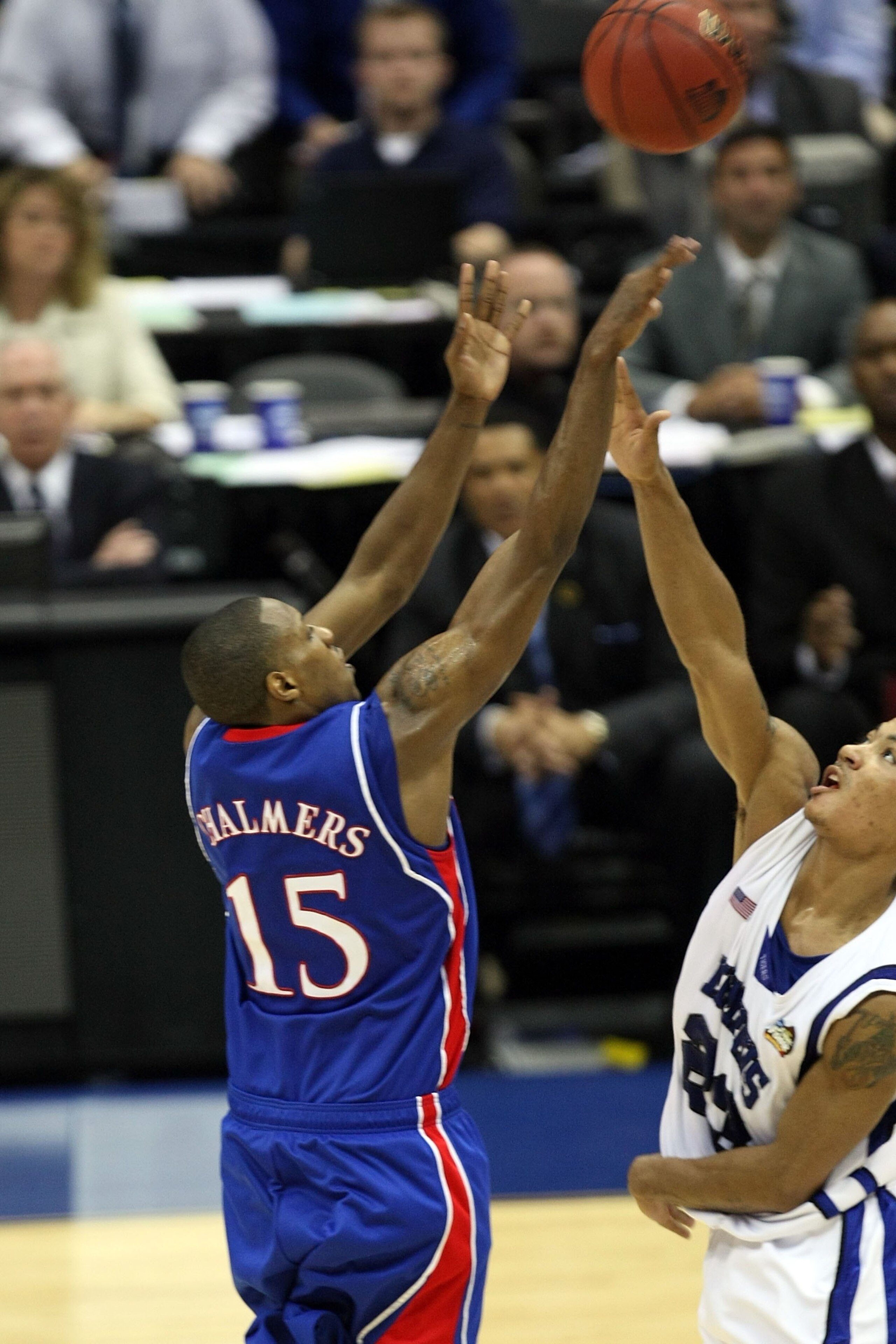SAN ANTONIO - APRIL 07:  Mario Chalmers #15 of the Kansas Jayhawks shoots and makes a three-pointer to tie the game to send it into overtime against the Memphis Tigers during the 2008 NCAA Men's National Championship game at the Alamodome on April 7, 2008