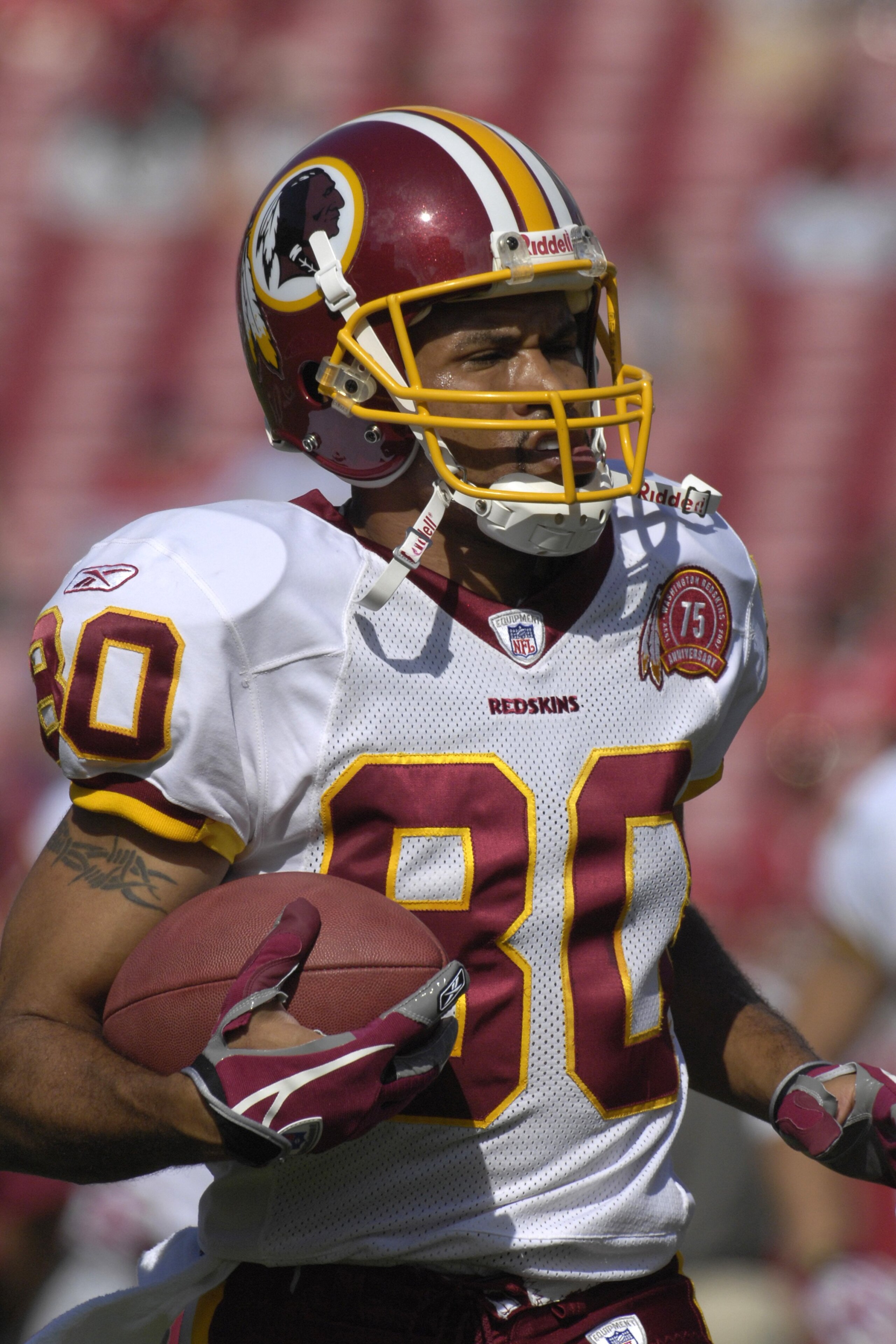 TAMPA, FL - NOVEMBER 25: Wide receiver Keenan McCardell #80 of the Washington Redskins grabs a warm up pass before play against the Tampa Bay Buccaneers at the Raymond James Stadium on November 25, 2007 in Tampa, Florida.  The Bucs won 19-13. (Photo by Al