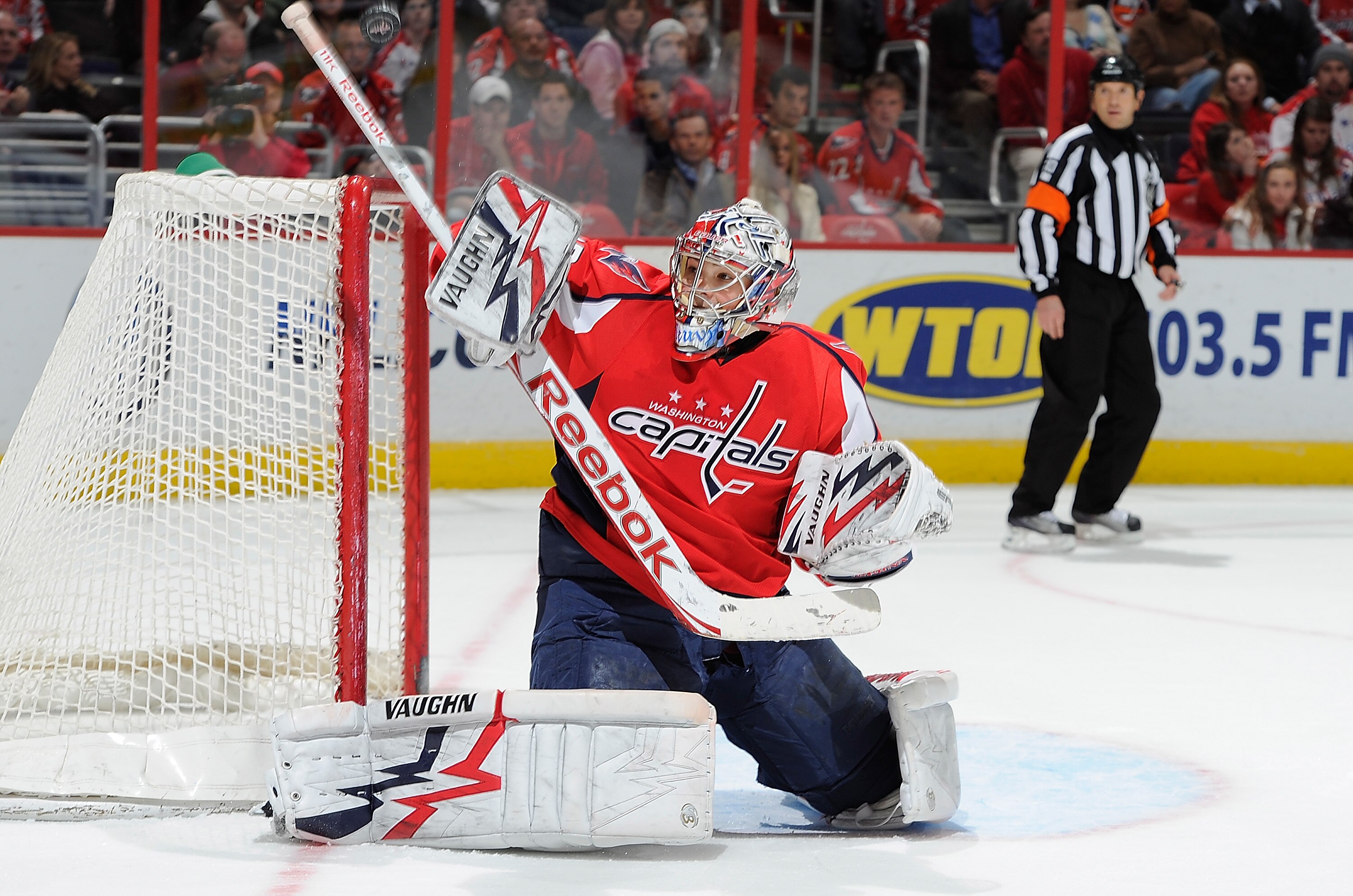 WASHINGTON, DC - MARCH 01:  Michal Neuvirth #30 of the Washington Capitals makes a save against the New York Islanders at the Verizon Center on March 1, 2011 in Washington, DC.  (Photo by Greg Fiume/Getty Images)