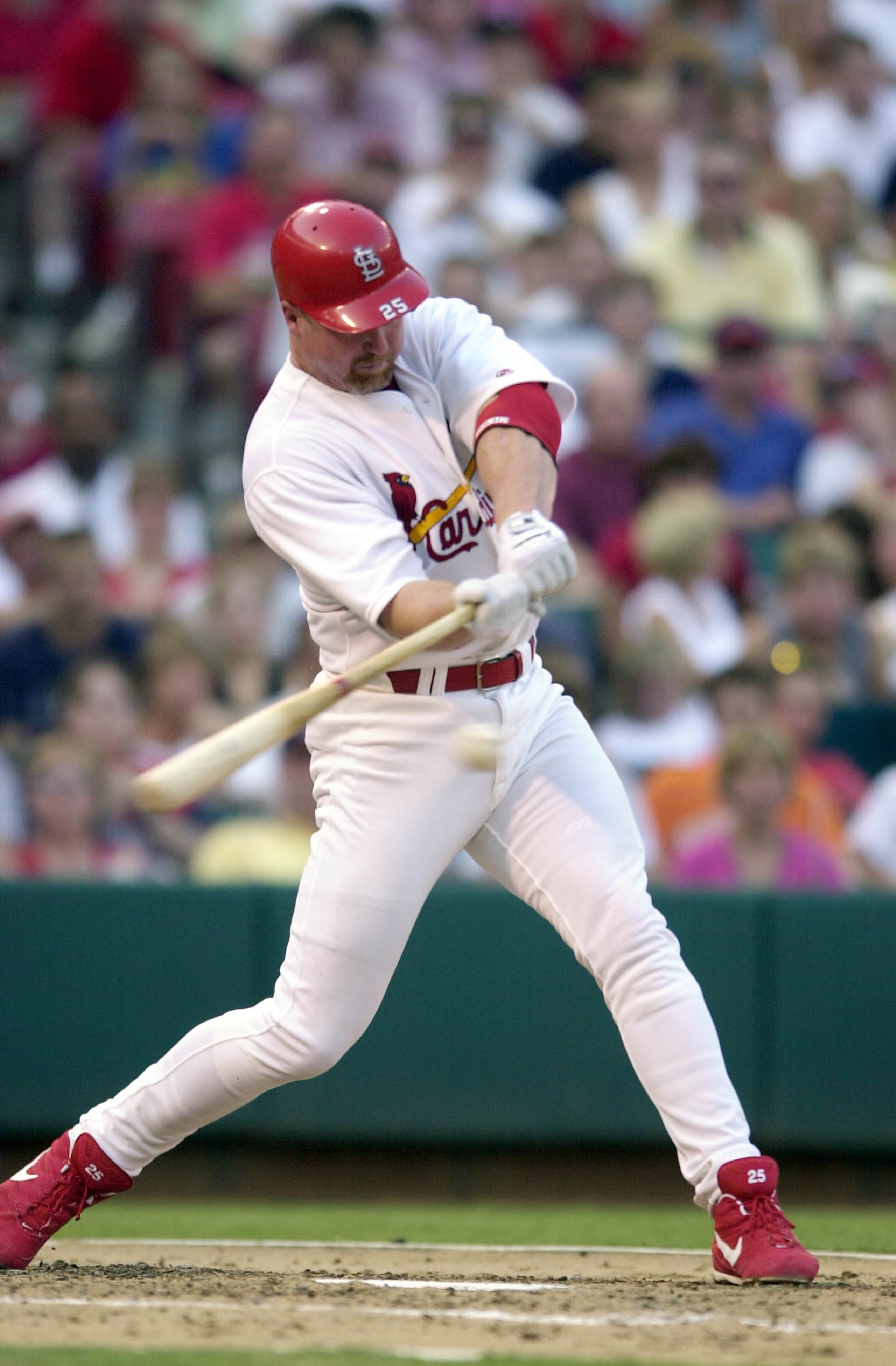 01 Aug 2000: Mark McGwire #25 of the St. Louis Cardinals hit a two-run homer during the game against the Atlanta Braves at Busch Stadium in St. Louis, Missouri. The Cardinals beat the Atlanta Braves 0-4. DIGITAL IMAGE. Mandatory Credit: Elsa/ALLSPORT 01 Aug 2000: Mark McGwire #25 of the St. Louis Cardinals hit a two-run homer during the game against the Atlanta Braves at Busch Stadium in St. Louis, Missouri. The Cardinals beat the Atlanta Braves 0-4. DIGITAL IMAGE. Mandatory Credit: Elsa/ALLSPORT
