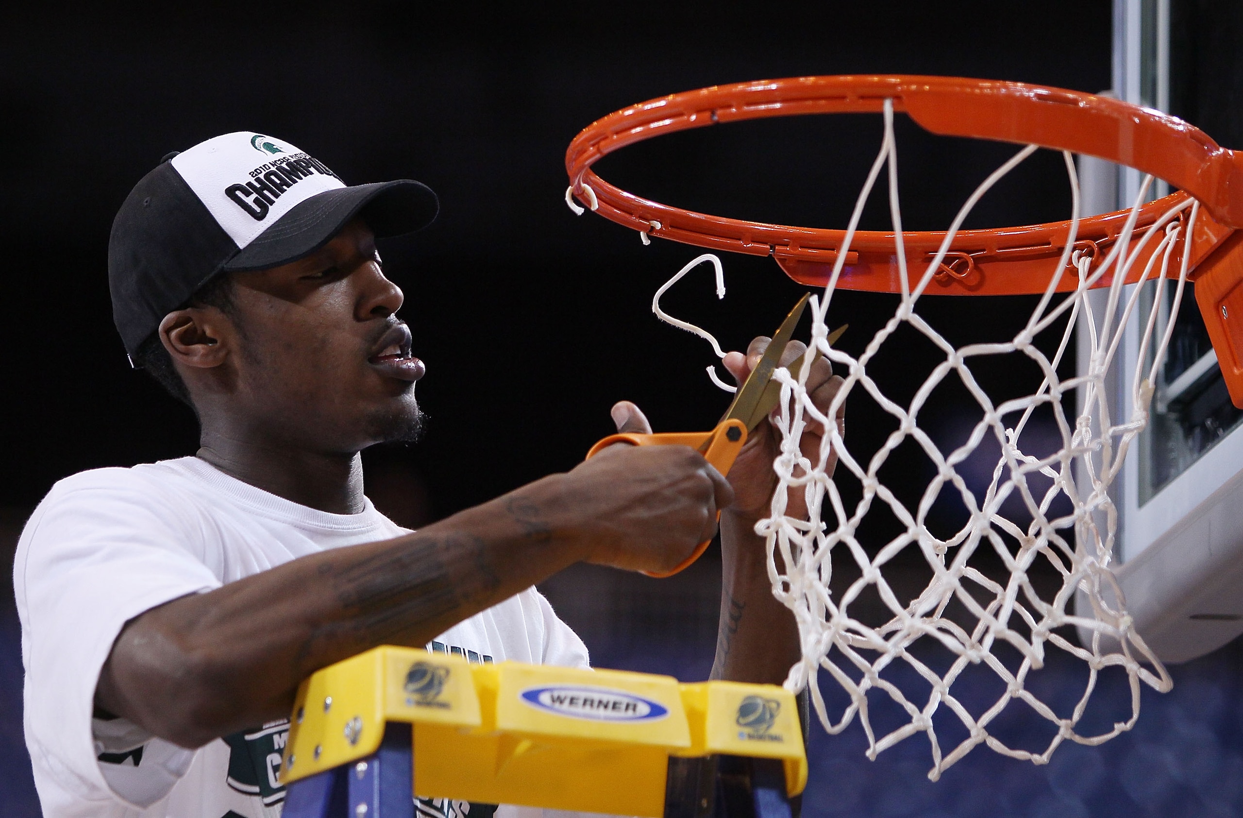 ST. LOUIS - MARCH 28:  Durrell Summers #15 of the Michigan State Spartans cuts a piece of the net after the win over the Tennessee Volunteers during the midwest regional final of the 2010 NCAA men's basketball tournament at the Edward Jones Dome on March