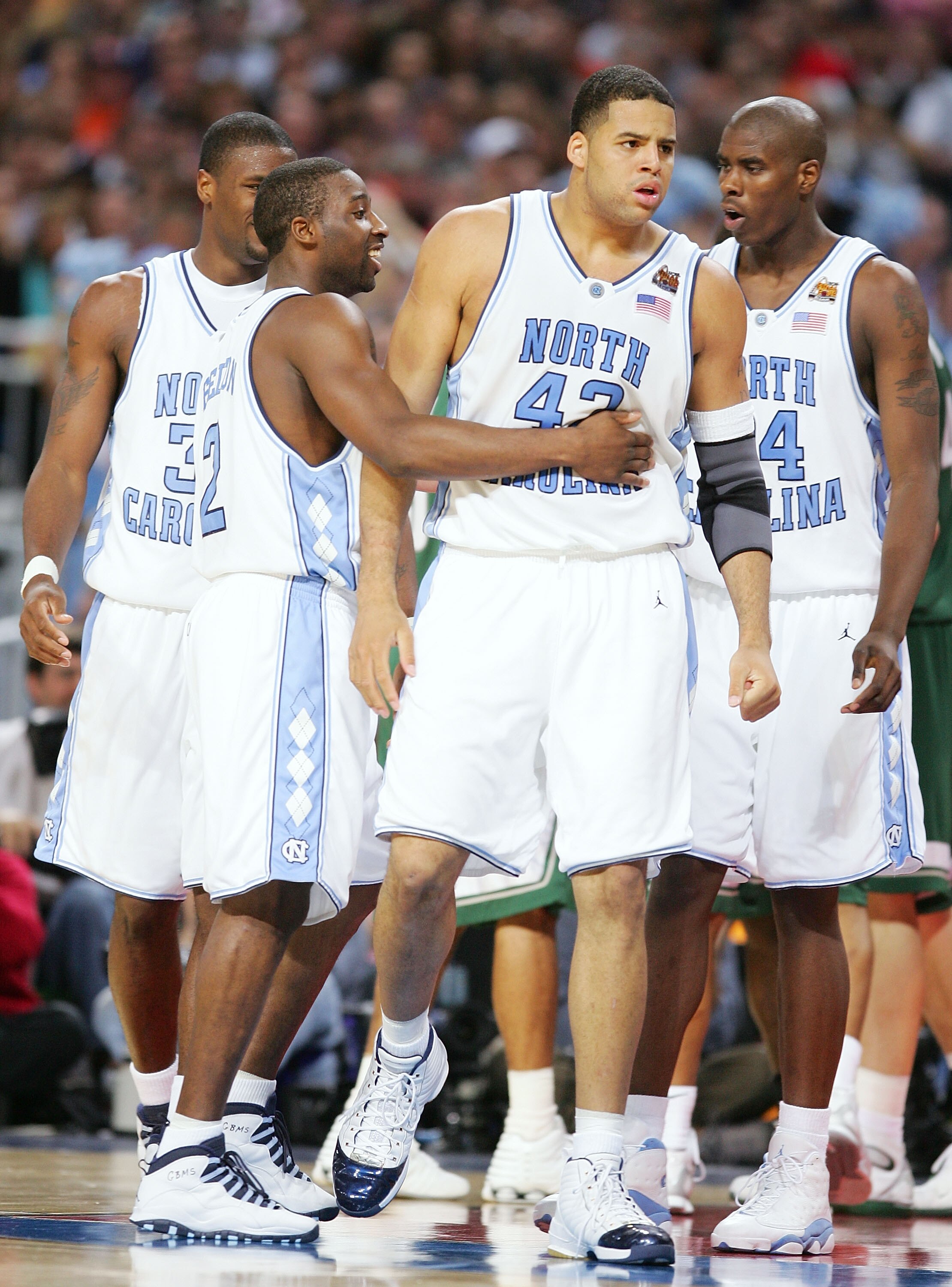 ST. LOUIS - APRIL 02:  Sean May #42 and Raymond Felton #2 of the North Carolina Tar Heels react after a play against the Michigan State Spartans in the second half during the NCAA Men's Final Four at the Edward Jones Dome on April 2, 2005 in St. Louis, Mi