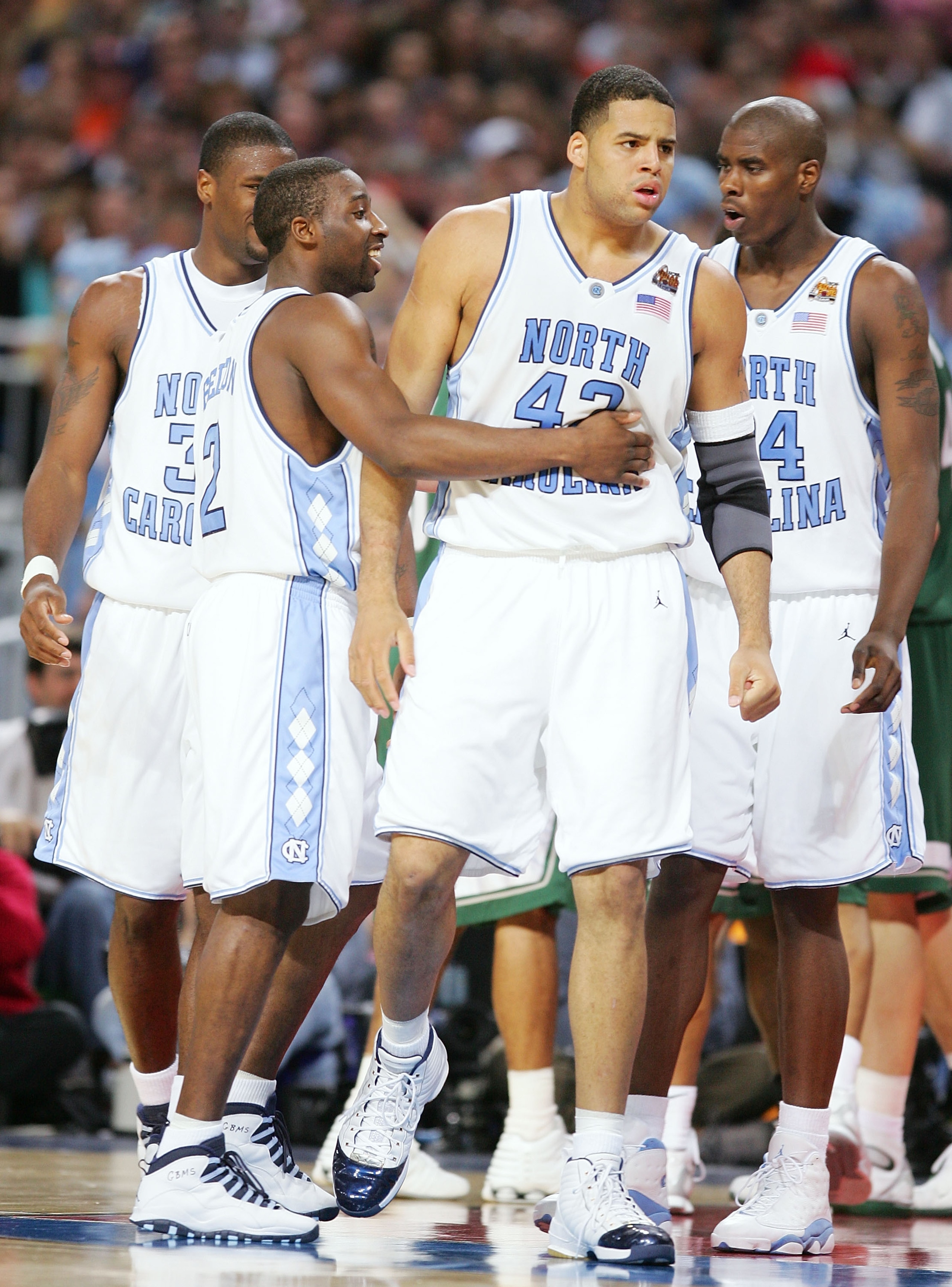 ST. LOUIS - APRIL 02:  Sean May #42 and Raymond Felton #2 of the North Carolina Tar Heels react after a play against the Michigan State Spartans in the second half during the NCAA Men's Final Four at the Edward Jones Dome on April 2, 2005 in St. Louis, Mi
