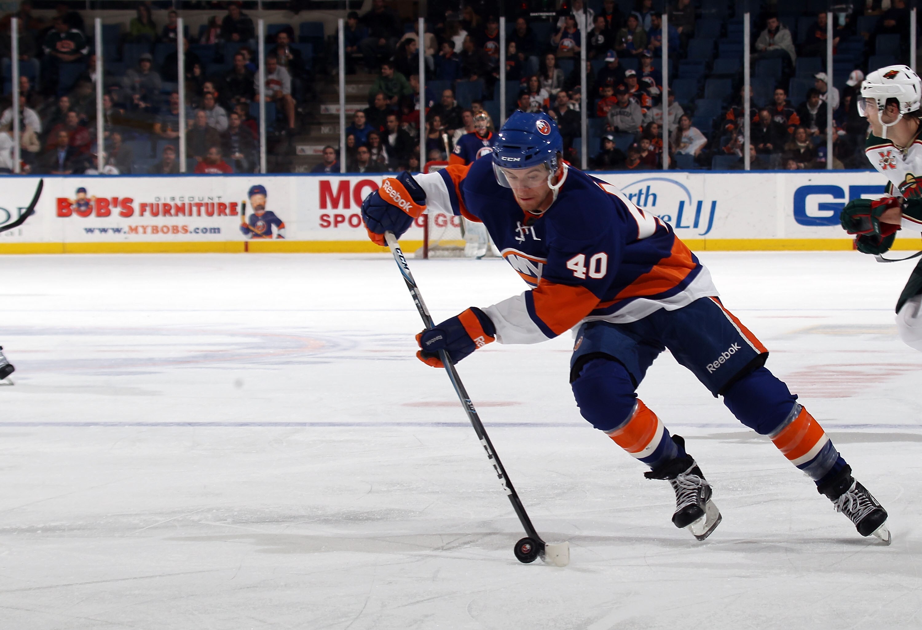UNIONDALE, NY - MARCH 02:  Michael Grabner #40 of the New York Islanders skates against the Minnesota Wild at the Nassau Coliseum on March 2, 2011 in Uniondale, New York. The Islanders defeated the Wild 4-1.  (Photo by Bruce Bennett/Getty Images)