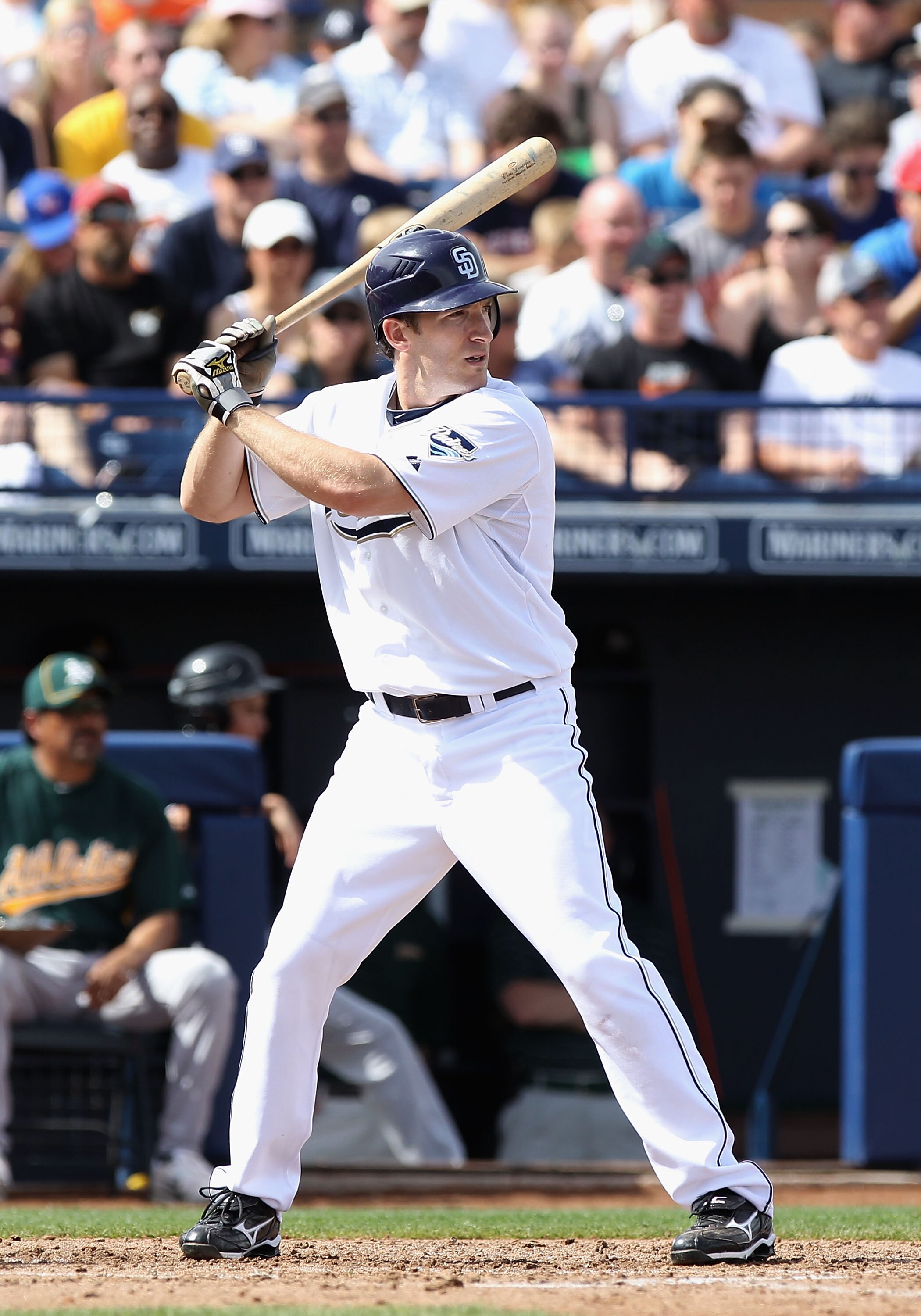 PEORIA, AZ - MARCH 06:  Chris Denorfia #13 of the San Diego Padres bats against the Oakland Athletics during the spring training game at Peoria Stadium on March 6, 2011 in Peoria, Arizona.  (Photo by Christian Petersen/Getty Images)