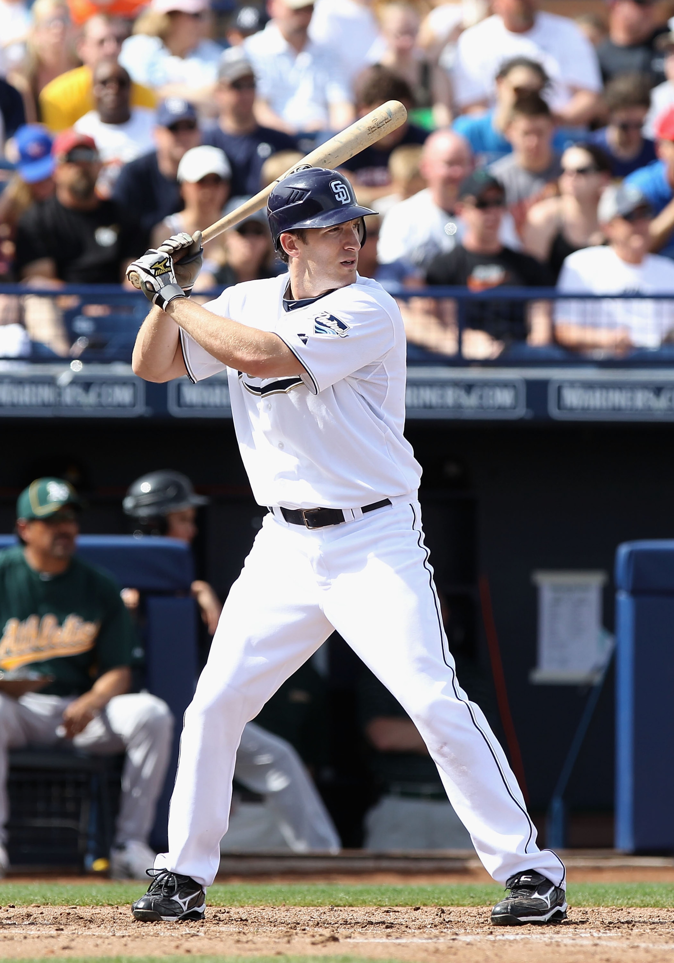 PEORIA, AZ - MARCH 06:  Chris Denorfia #13 of the San Diego Padres bats against the Oakland Athletics during the spring training game at Peoria Stadium on March 6, 2011 in Peoria, Arizona.  (Photo by Christian Petersen/Getty Images)