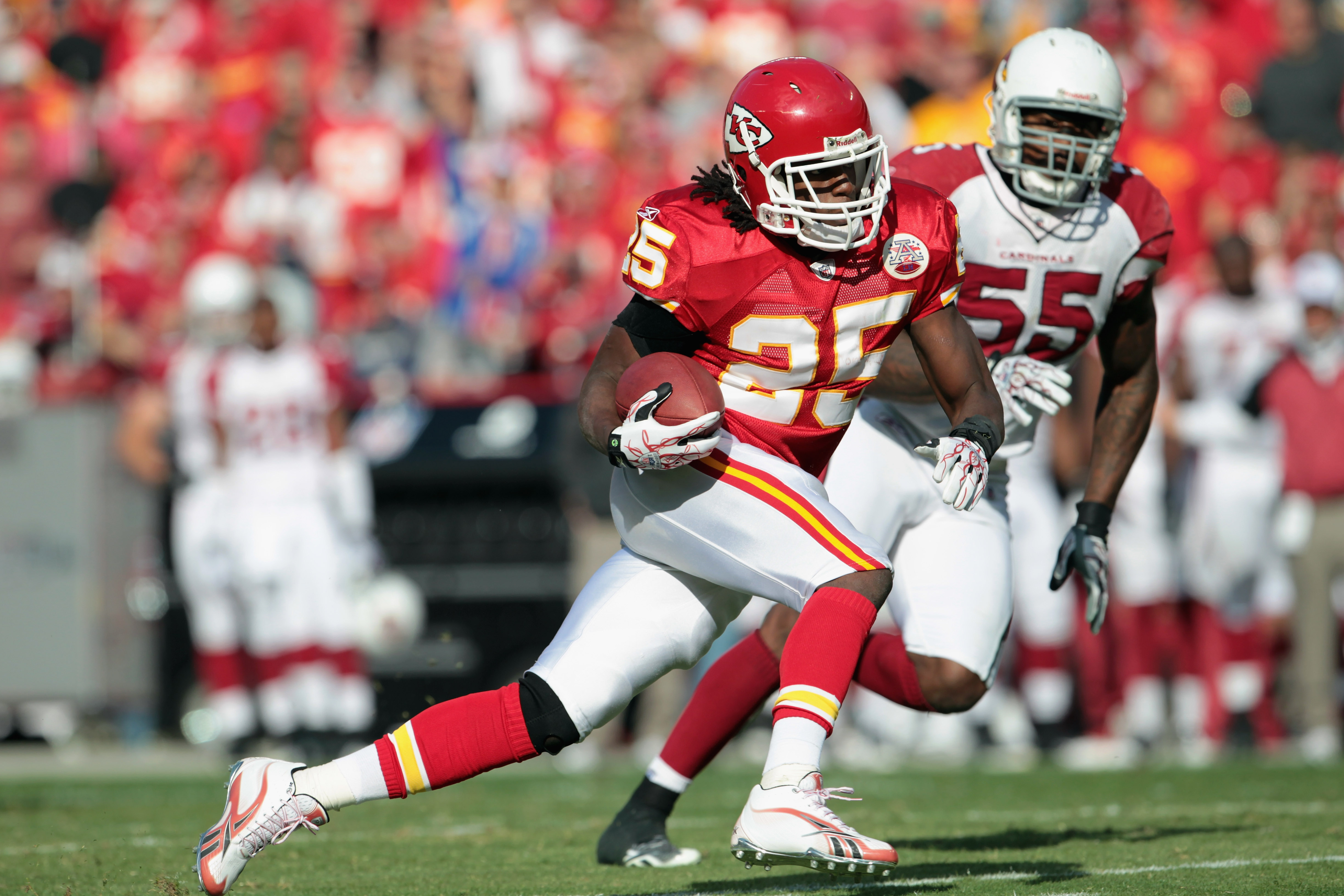 Larry Johnson of the Kansas City Chiefs is tackled by Luis Castillo News  Photo - Getty Images