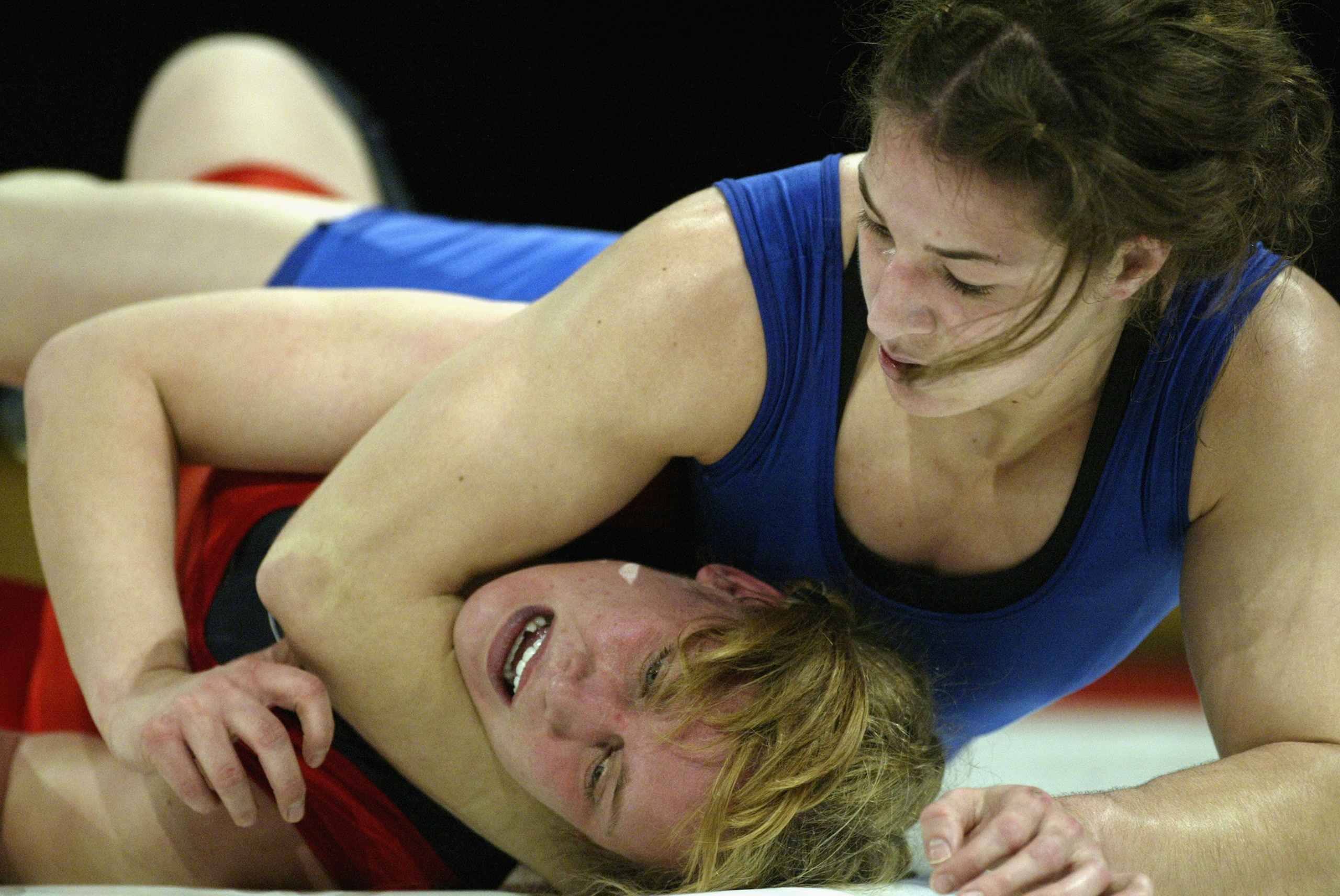 SAN JOSE, CA - FEBRUARY 14:  Sara McMann (R)of the USA competes against Trish Liebel of Canada during the wrestling portion of the Titan Games at the Events Center at San Jose State on Febraury 14, 2003 in San Jose, California.  (Photo by Jed Jacobsohn/Ge