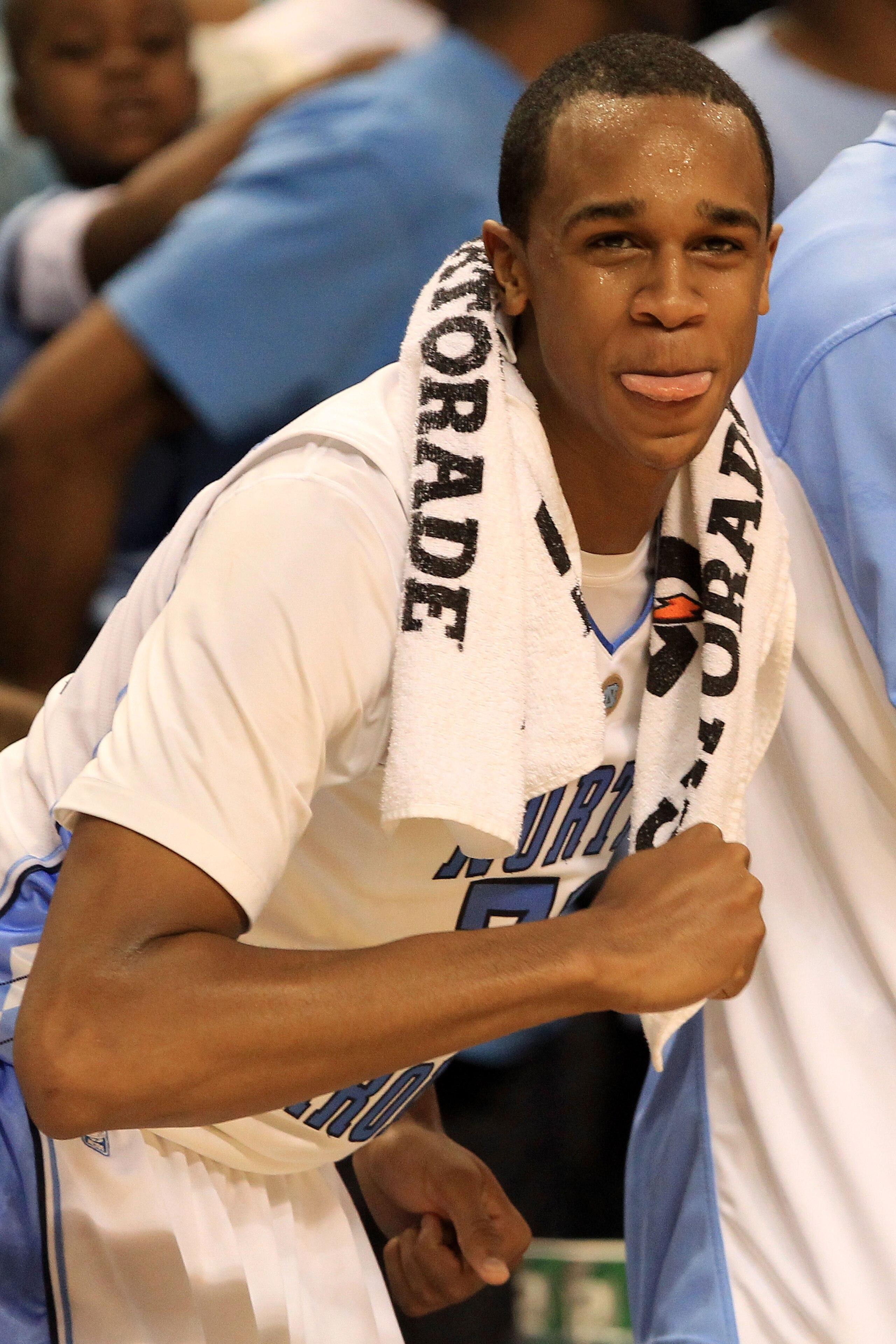 GREENSBORO, NC - MARCH 11:  John Henson #31 of the North Carolina Tar Heels cheers for his team as they play against the Miami Hurricanes during the second half in the quarterfinals of the 2011 ACC men's basketball tournament at the Greensboro Coliseum on