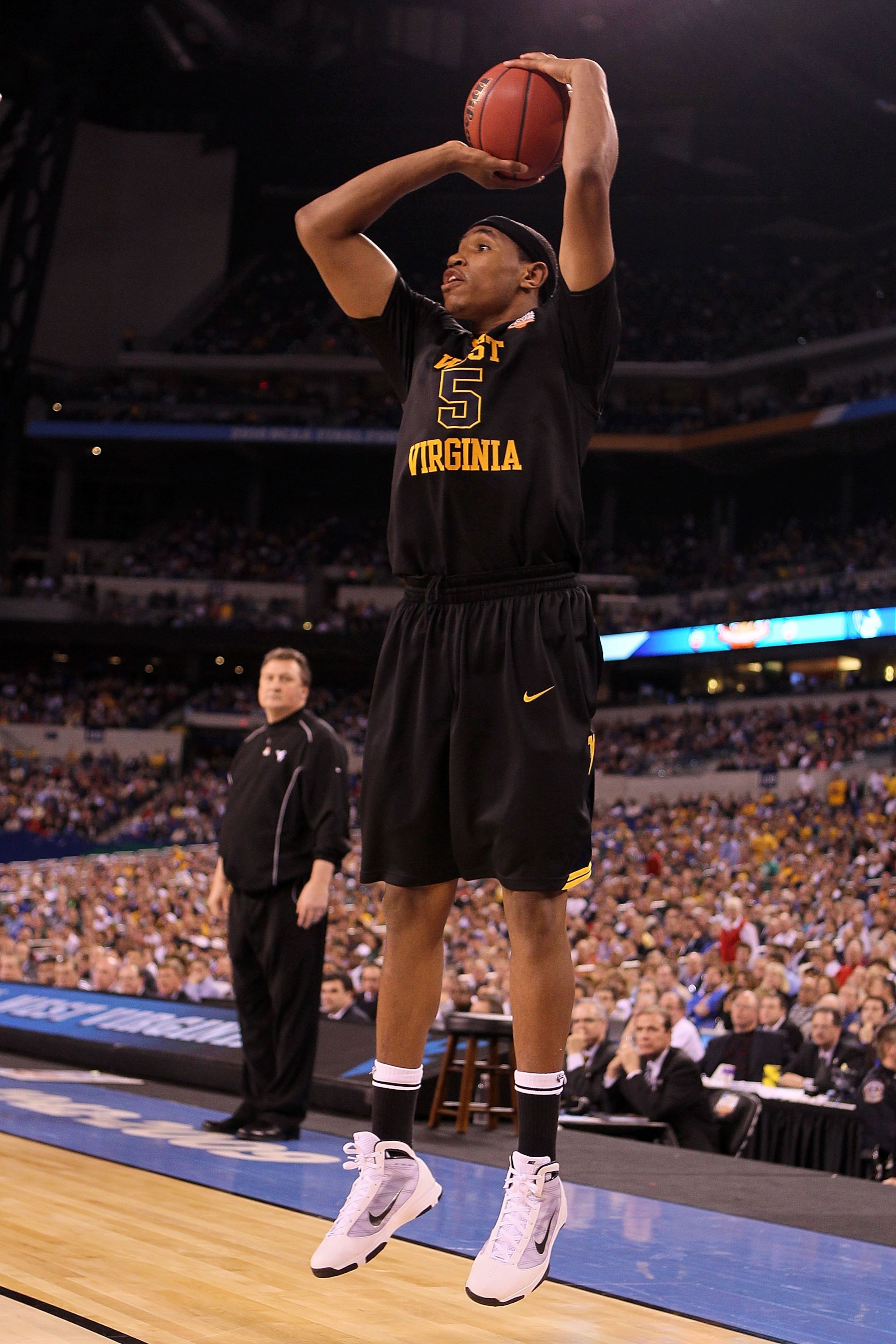 INDIANAPOLIS - APRIL 03:  Kevin Jones #5 of the West Virginia Mountaineers shoots the ball while taking on the Duke Blue Devils during the National Semifinal game of the 2010 NCAA Division I Men's Basketball Championship at Lucas Oil Stadium on April 3, 2