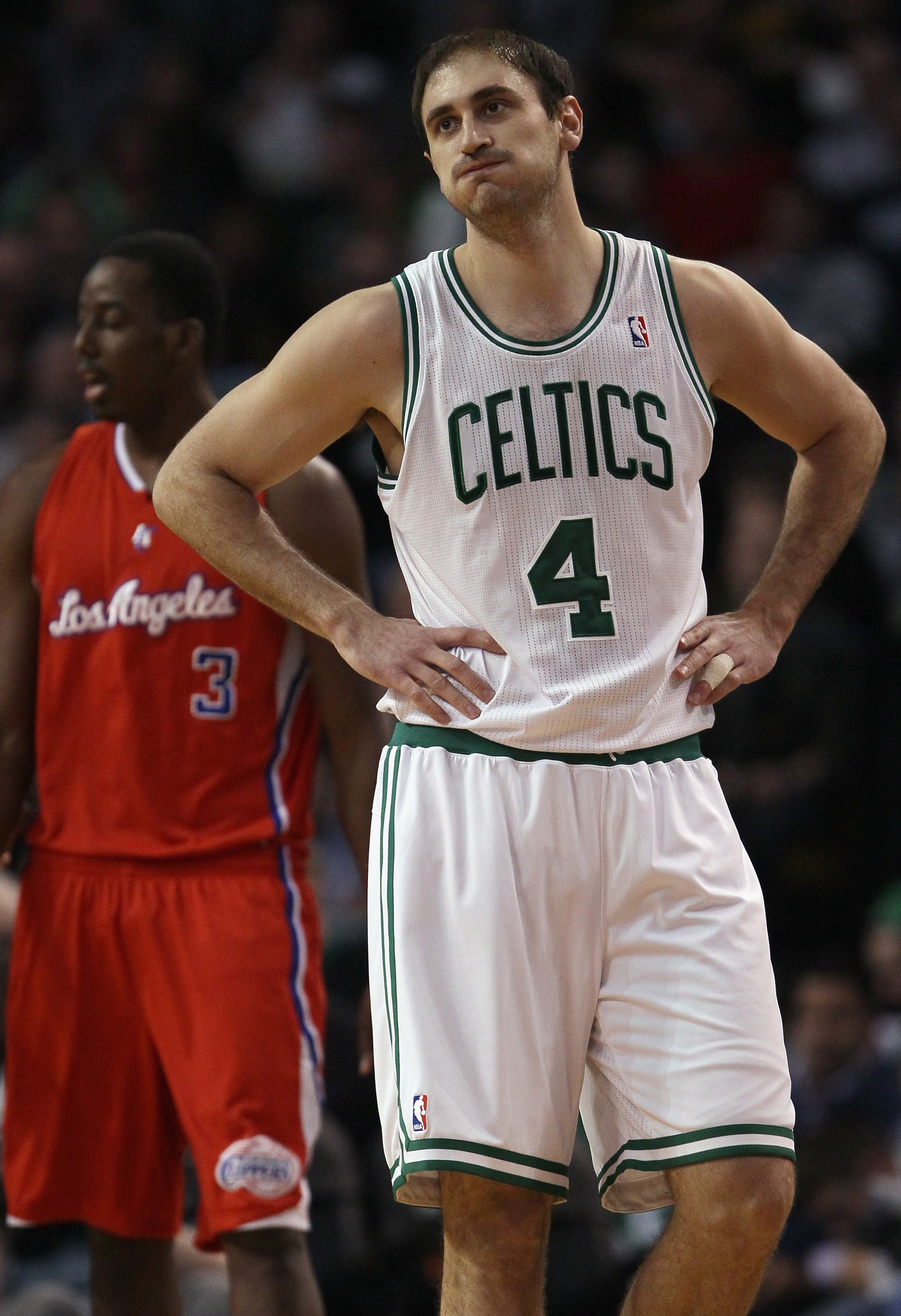 BOSTON, MA - MARCH 09: Nenad Krstic #4 of the Boston Celtics reacts to a call against the Celtics in the first half as Al-Farouq Aminu #3 of the Los Angeles Clippers stands by on March 9, 2011 at the TD Garden in Boston, Massachusetts. NOTE TO USER: User BOSTON, MA - MARCH 09: Nenad Krstic #4 of the Boston Celtics reacts to a call against the Celtics in the first half as Al-Farouq Aminu #3 of the Los Angeles Clippers stands by on March 9, 2011 at the TD Garden in Boston, Massachusetts. NOTE TO USER: User