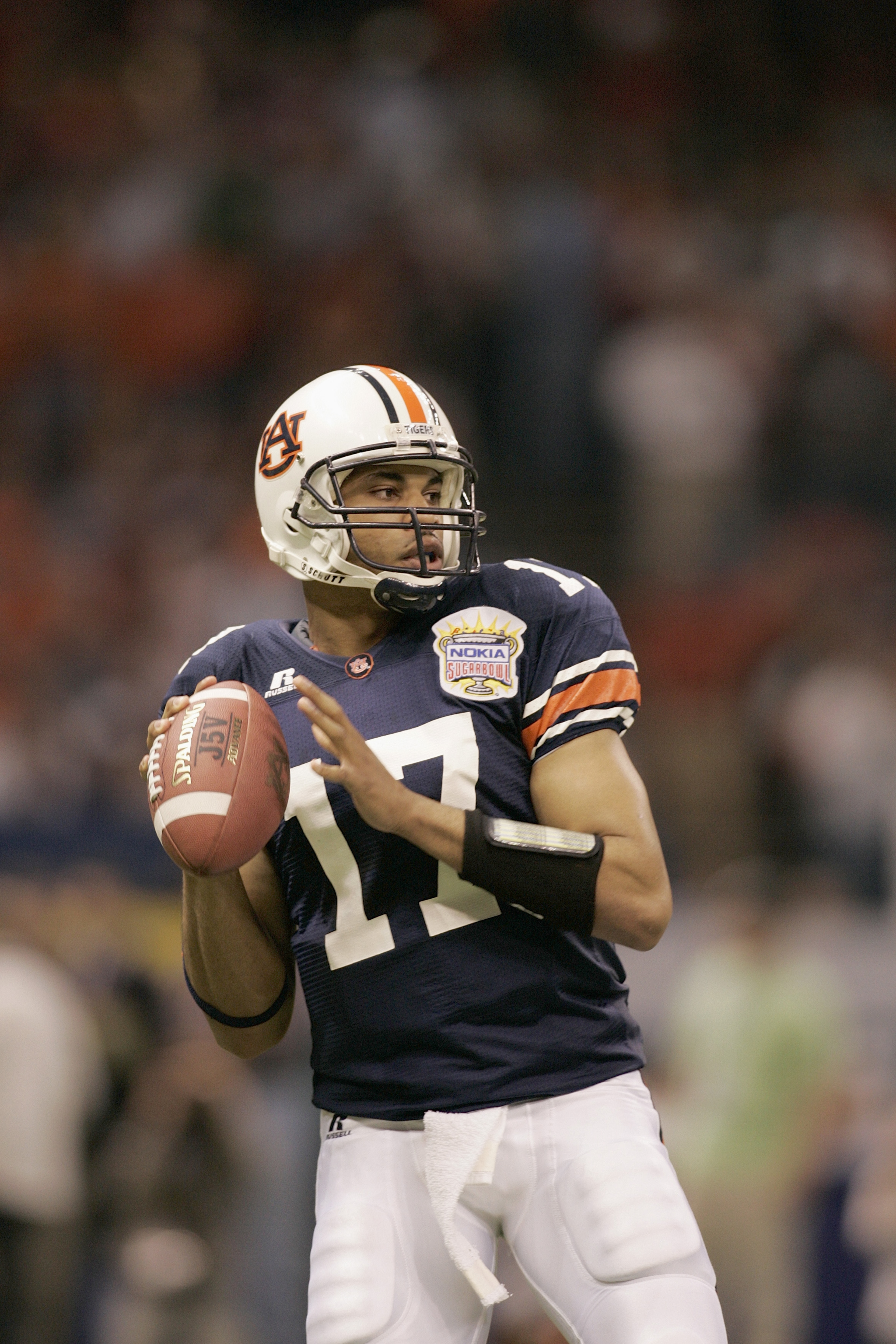 NEW ORLEANS - JANUARY 3:  Quarterback Jason Campbell #17 of the Auburn Tigers looks to pass against the Virginia Tech Hokies during the Nokia Sugar Bowl on January 3, 2005 at the Superdome in New Orleans, Louisiana.  Auburn defeated Virginia Tech 16-13.