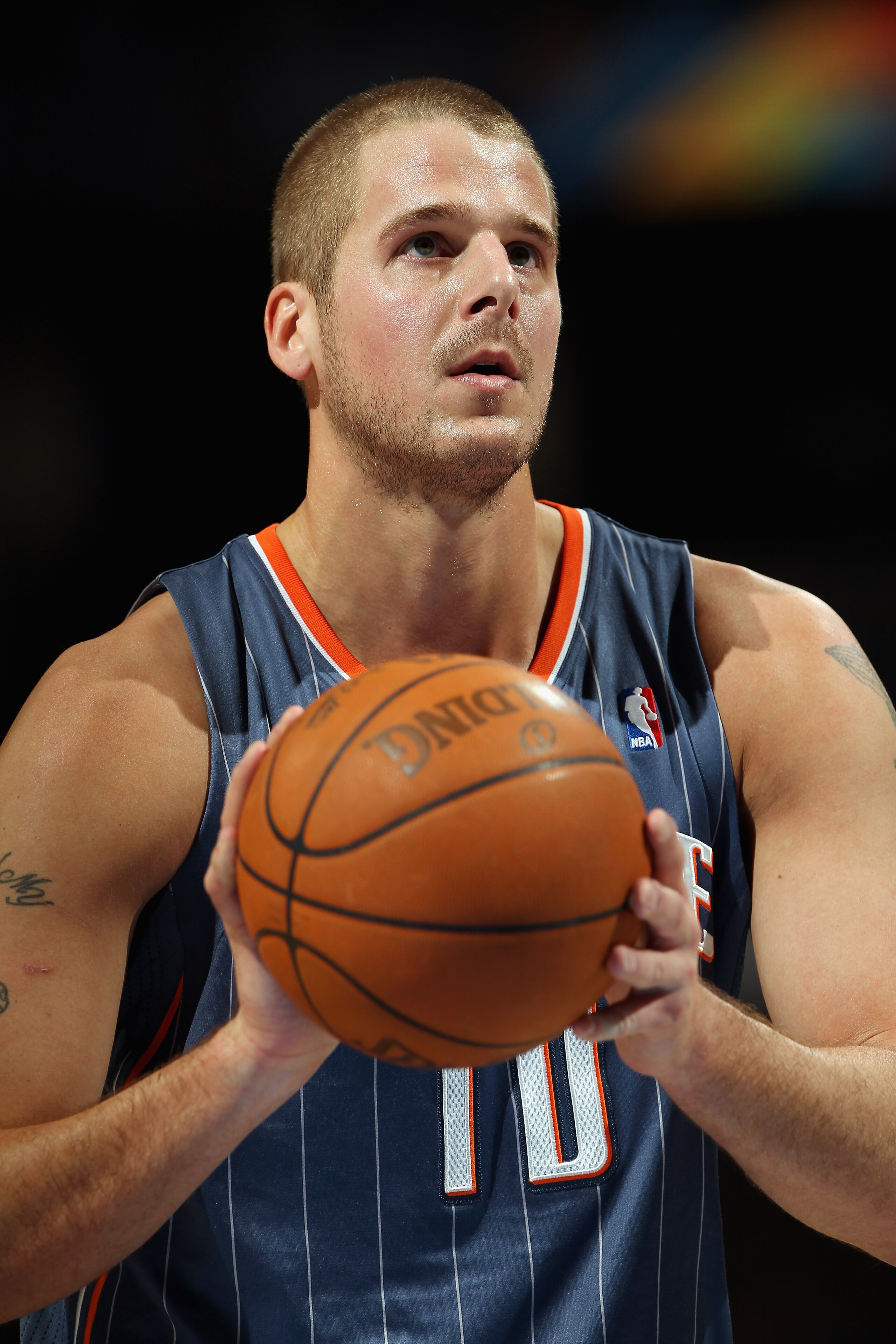 DENVER, CO - MARCH 02: Joel Pryzbilla #10 of the Charlotte Bobcats takes a free throw against the Denver Nuggets at the Pepsi Center on March 2, 2011 in Denver, Colorado. The Nuggets defeated the Bobcats 120-80.NOTE TO USER: User expressly acknowledges a DENVER, CO - MARCH 02: Joel Pryzbilla #10 of the Charlotte Bobcats takes a free throw against the Denver Nuggets at the Pepsi Center on March 2, 2011 in Denver, Colorado. The Nuggets defeated the Bobcats 120-80.NOTE TO USER: User expressly acknowledges a