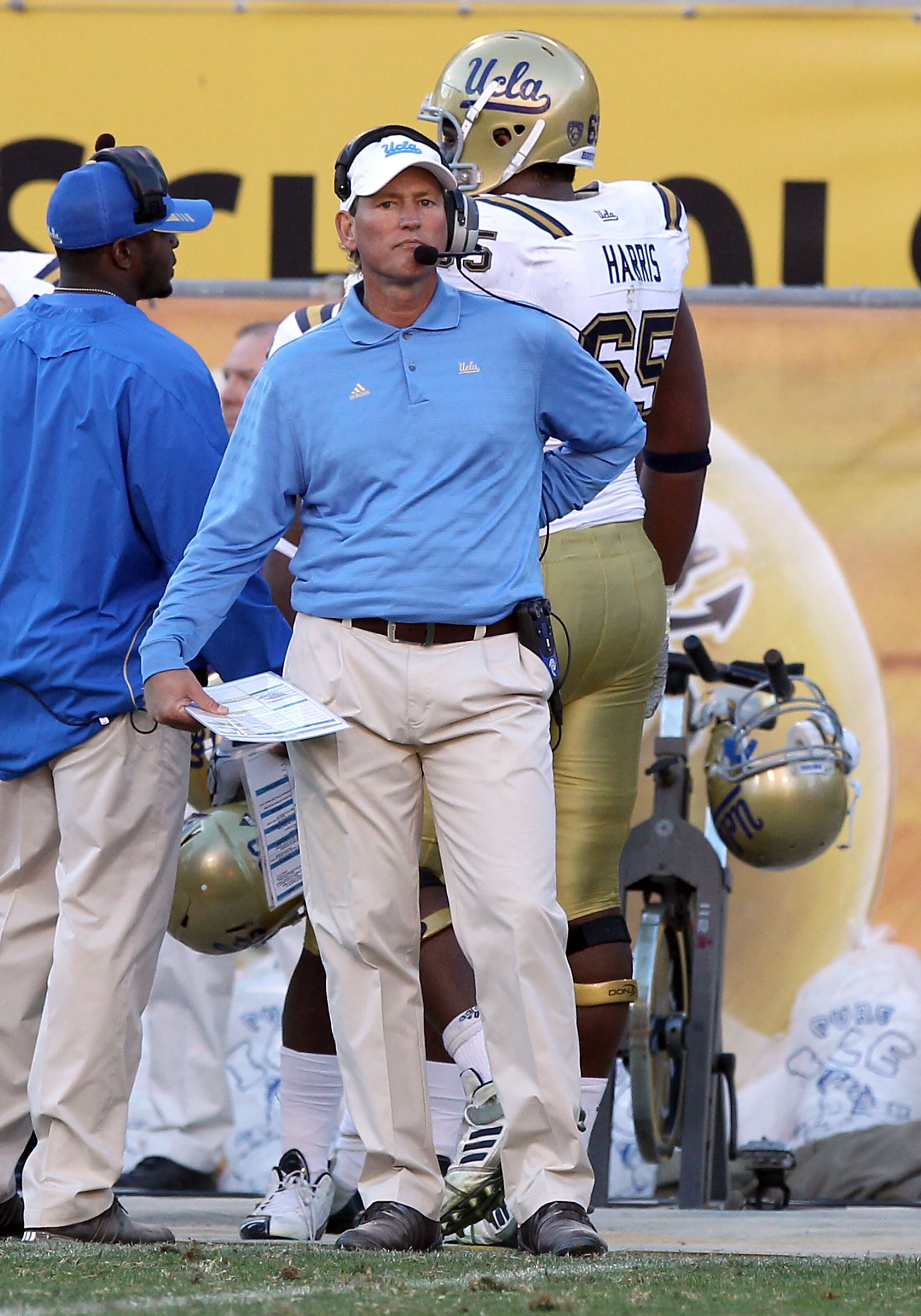 TEMPE, AZ - NOVEMBER 26:  Head coach Rick Neuheisel of the UCLA Bruins watches from the sidelines during the college football game against the Arizona State Sun Devils at Sun Devil Stadium on November 26, 2010 in Tempe, Arizona. The Sun Devils defeated th
