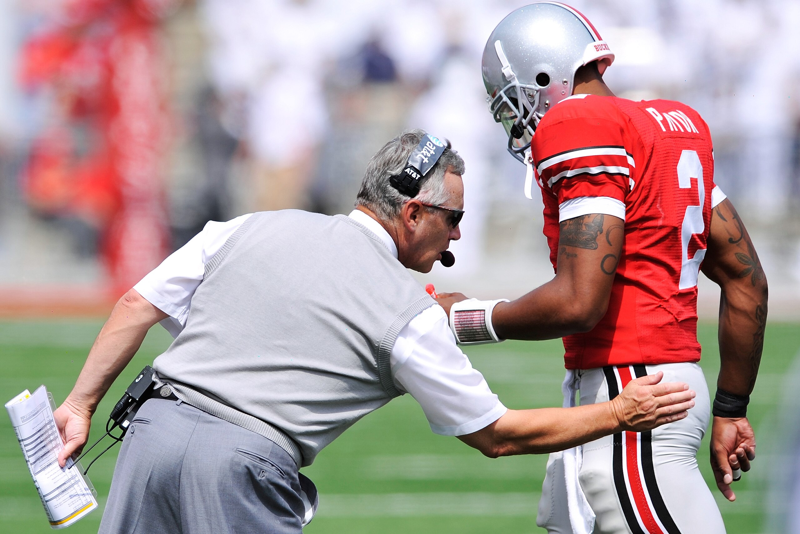 COLUMBUS, OH - SEPTEMBER 05:  Head coach Jim Tressel of the Ohio State Buckeyes congratulates his quarterback Terrelle Pryor #2 after the Buckeyes added another touchdown against the Navy Midshipmen at Ohio Stadium on September 5, 2009 in Columbus, Ohio.