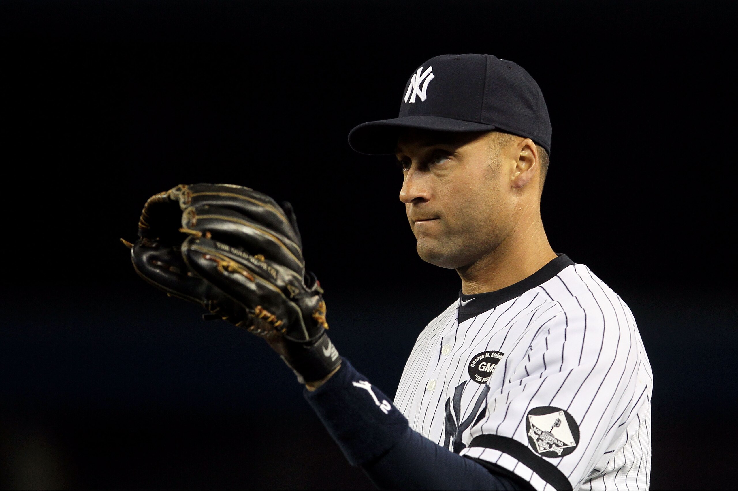 NEW YORK - OCTOBER 19:  Derek Jeter #2 of the New York Yankees warms up against the Texas Rangers in Game Four of the ALCS during the 2010 MLB Playoffs at Yankee Stadium on October 19, 2010 in the Bronx borough of New York City. The Rangers won 10-3.  (Ph