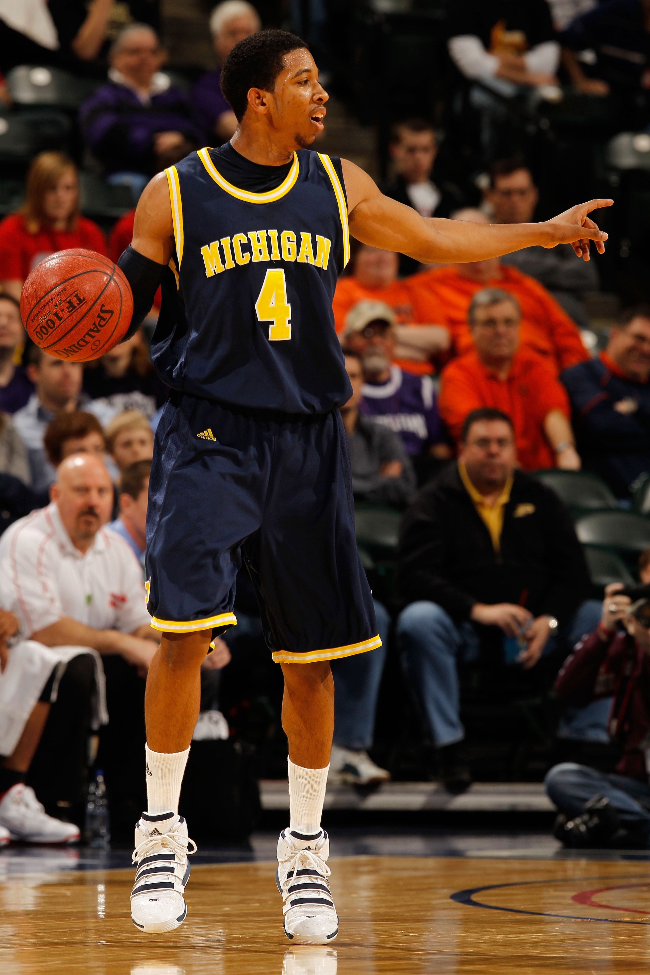 INDIANAPOLIS - MARCH 12: Guard Darius Morris #4 of the Michigan Wolverines controls the ball during the game against the Ohio State Buckeyes in the quarterfinals of the Big Ten Men's Basketball Tournament at Conseco Fieldhouse on March 12, 2010 in Indiana