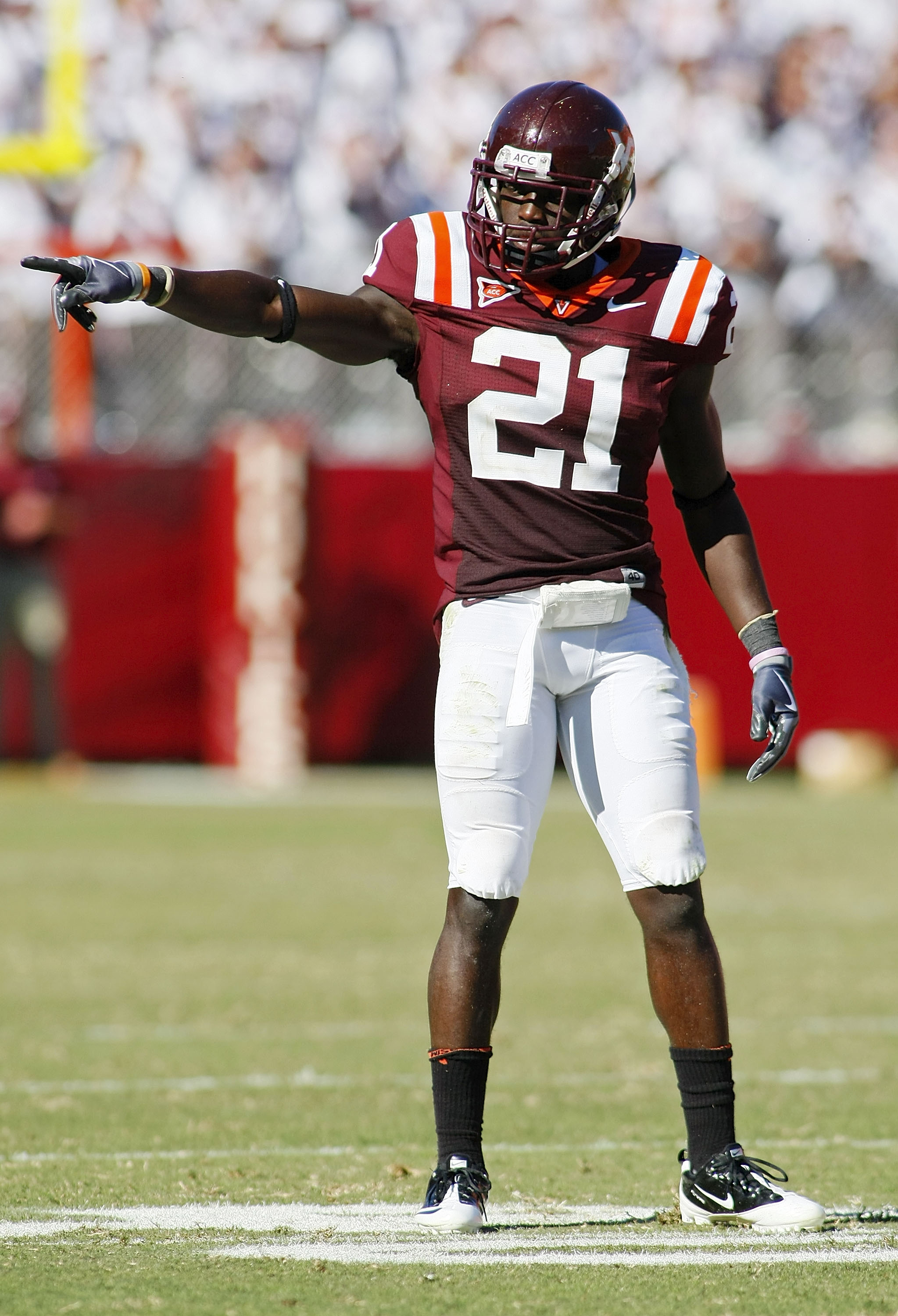 BLACKSBURG, VA - SEPTEMBER 18: Cornerback Rashad Carmichael #21 of the Virginia Tech Hokies signals on field against the East Carolina Pirates at Lane Stadium on September 18, 2010 in Blacksburg, Virginia. Virginia Tech won 49-27.  (Photo by Geoff Burke/G