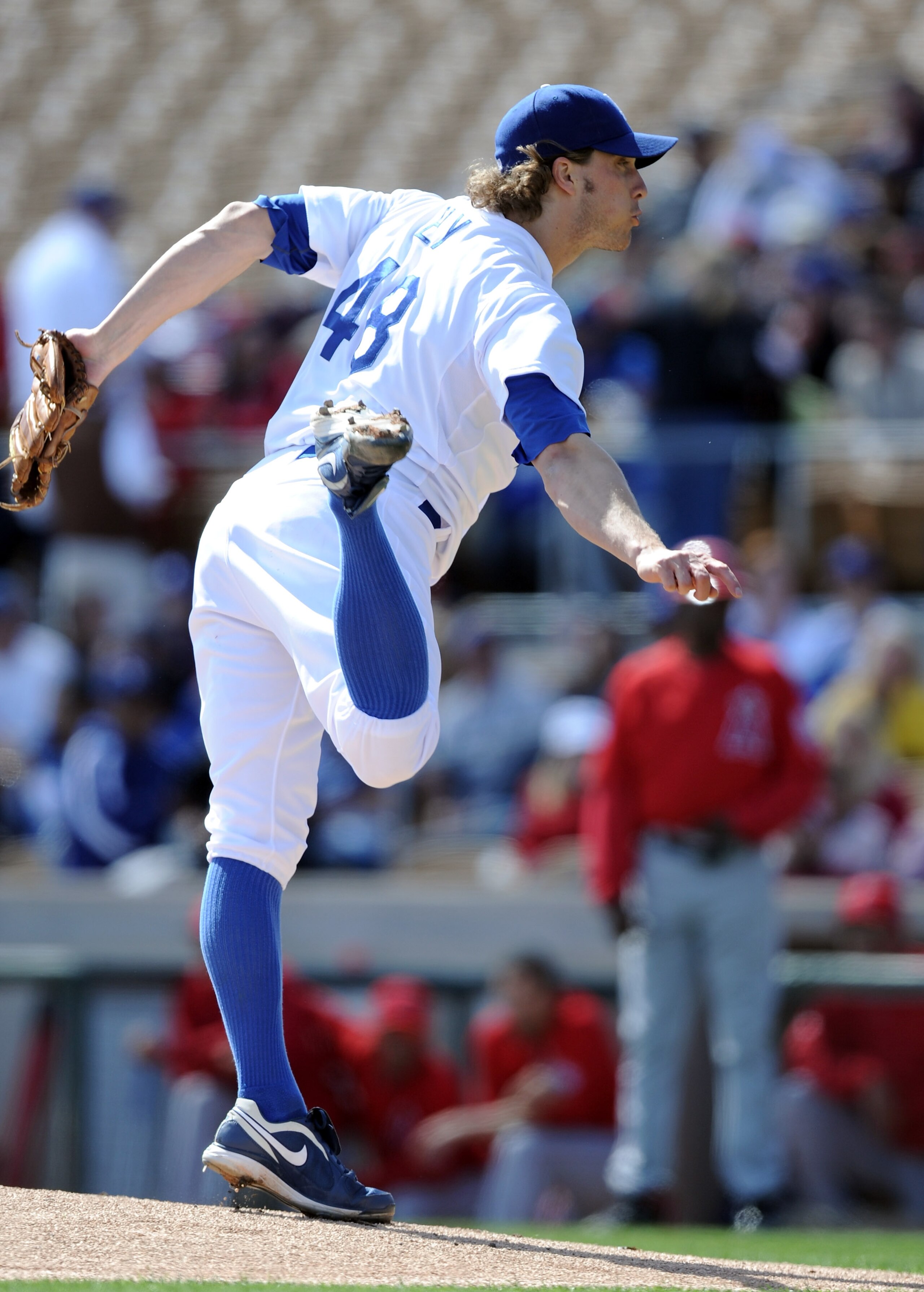 PHOENIX, AZ - FEBRUARY 27:  John Ely #48 of the Los Angeles Dodgers pitches against the  Los Angeles Angels in the first inning during spring training at Camelback Ranch on February 27, 2011 in Phoenix, Arizona.  (Photo by Harry How/Getty Images)