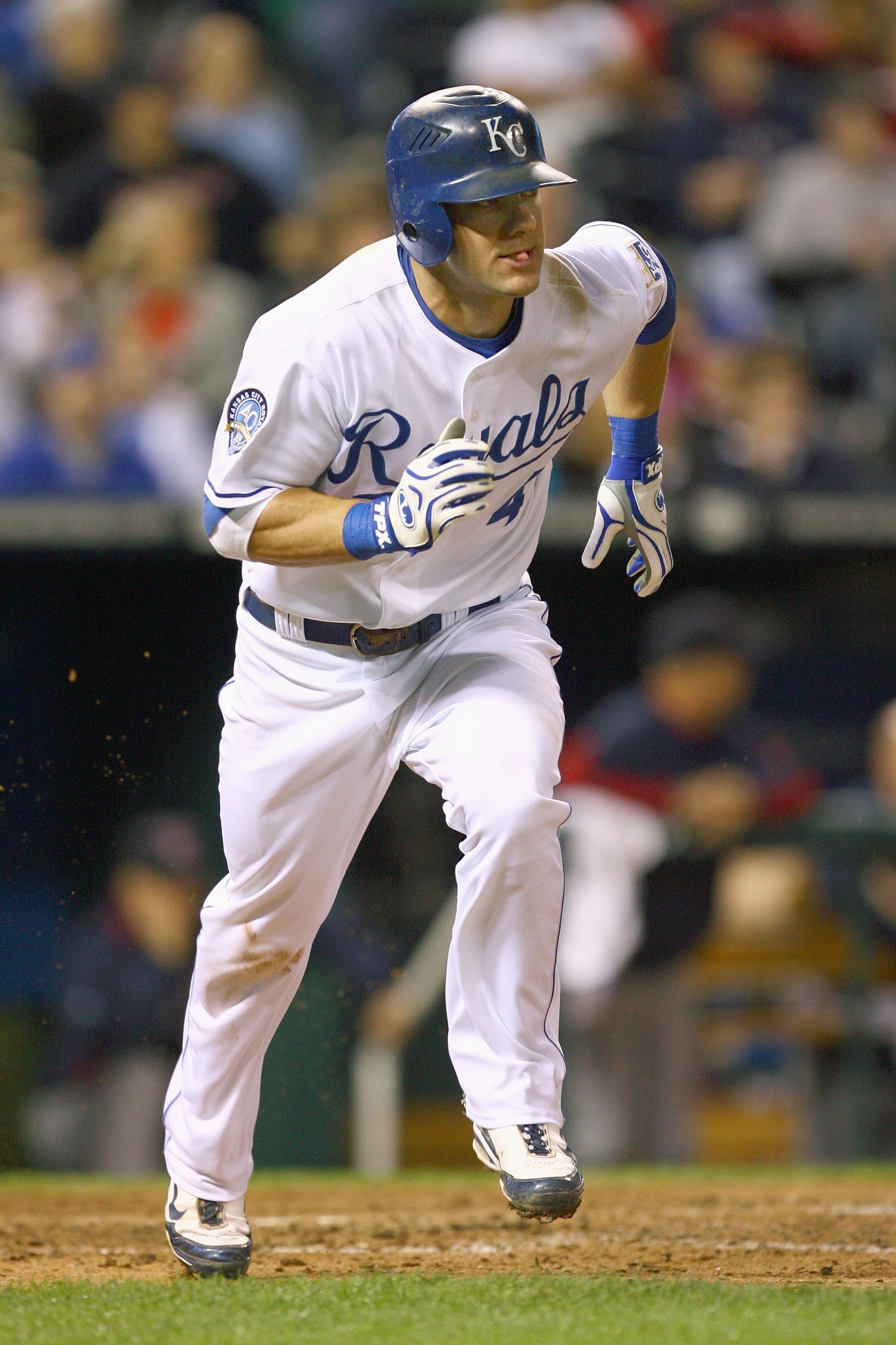 KANSAS CITY, MO - SEPTEMBER 24: Alex Gordon #4 of the Kansas City Royals runs to first base during the game against the Boston Red Sox on September 24, 2009 at Kauffman Stadium in Kansas City, Missouri. (Photo by Jamie Squire/Getty Images)