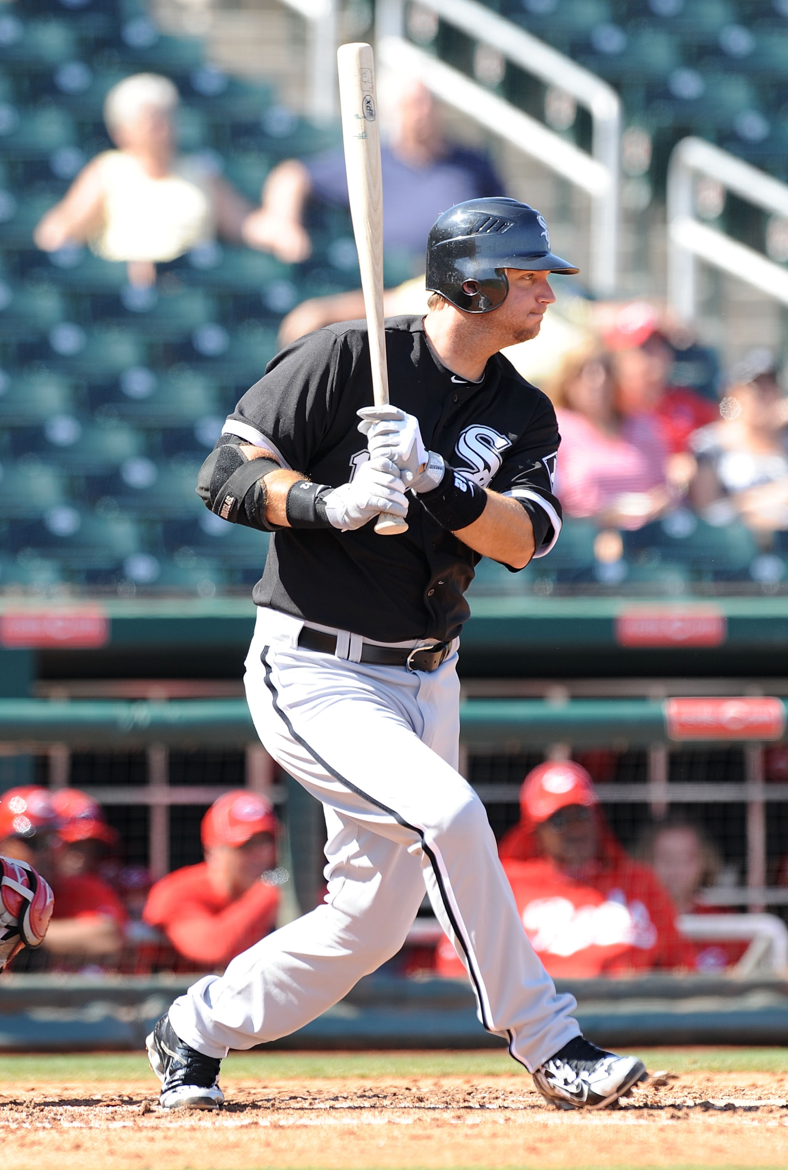 GOODYEAR, AZ - MARCH 02:  A.J. Pierzynski #12 of the Chicago White Sox his the ball into center field against the Cincinnati Reds at Goodyear Ballpark on March 2, 2011 in Goodyear, Arizona.  (Photo by Norm Hall/Getty Images)
