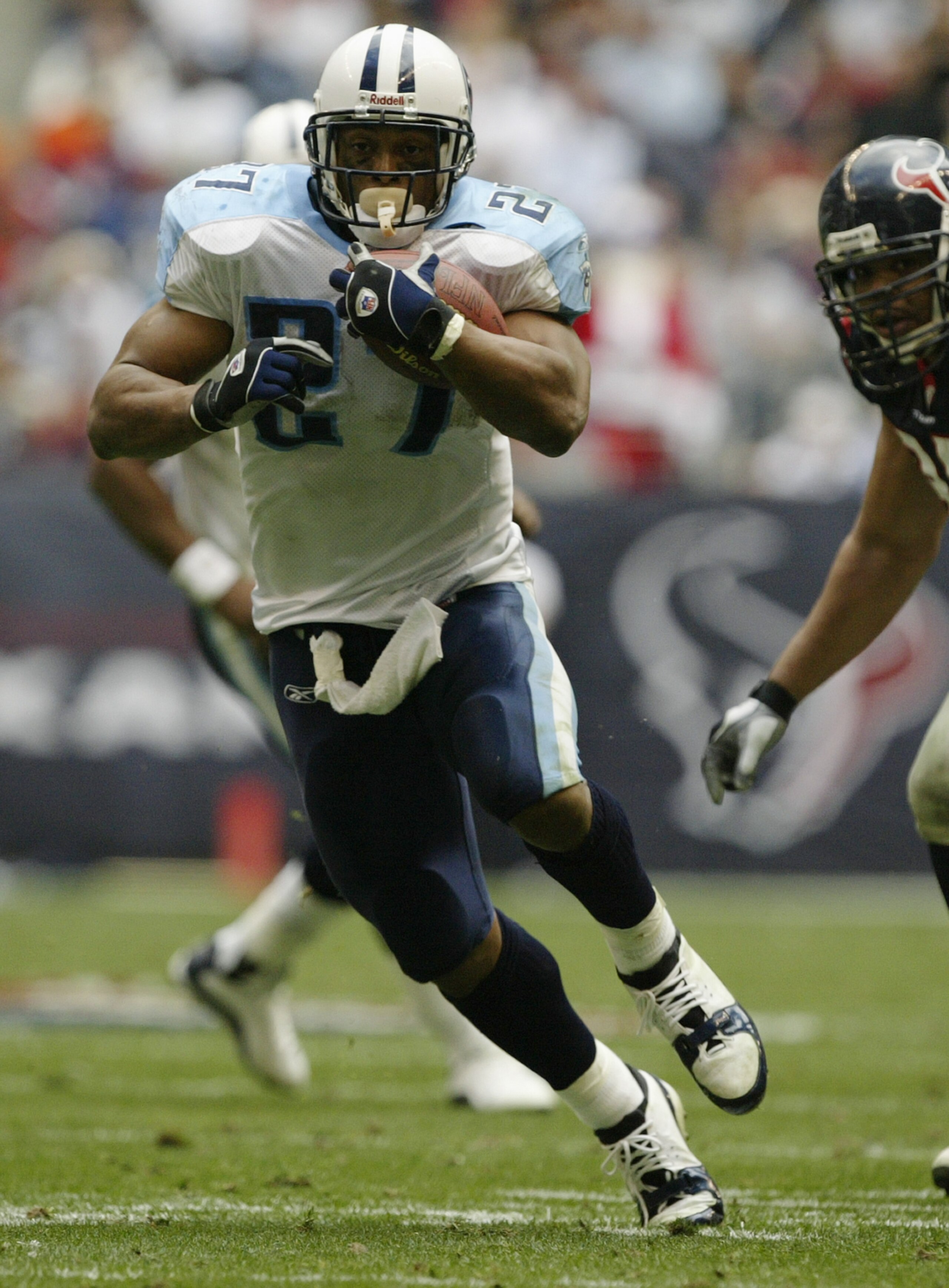 HOUSTON - DECEMBER 21: Running back Eddie George #27 of the Tennessee Titans runs the ball during the game against the Houston Texans on December 21, 2003 at Reliant Stadium in Houston, Texas. The Titans won 27-24. (Photo by Brian Bahr/Getty Images) HOUSTON - DECEMBER 21: Running back Eddie George #27 of the Tennessee Titans runs the ball during the game against the Houston Texans on December 21, 2003 at Reliant Stadium in Houston, Texas. The Titans won 27-24. (Photo by Brian Bahr/Getty Images)