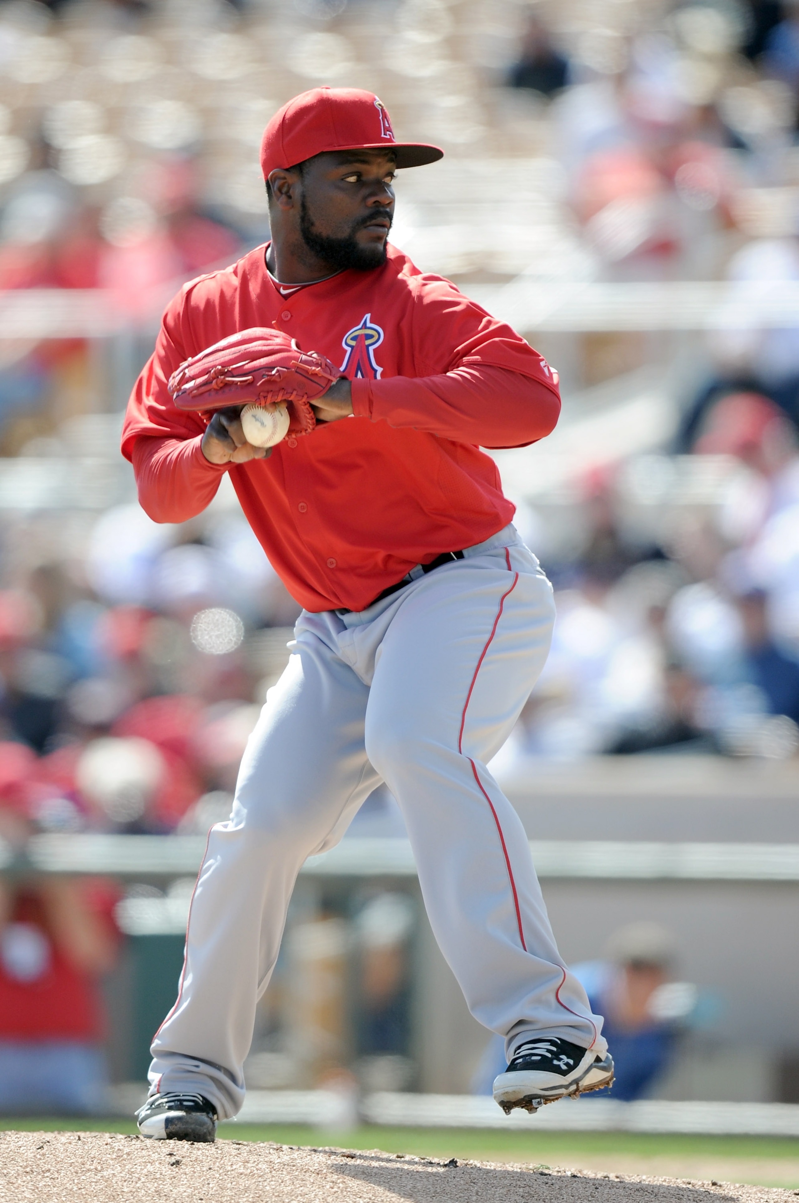 PHOENIX, AZ - FEBRUARY 27:  Fernando Rodney #56 of the Los Angeles Angels of Anaheim pitches against the Los Angeles Dodgers during spring training at Camelback Ranch on February 27, 2011 in Phoenix, Arizona.  (Photo by Harry How/Getty Images)