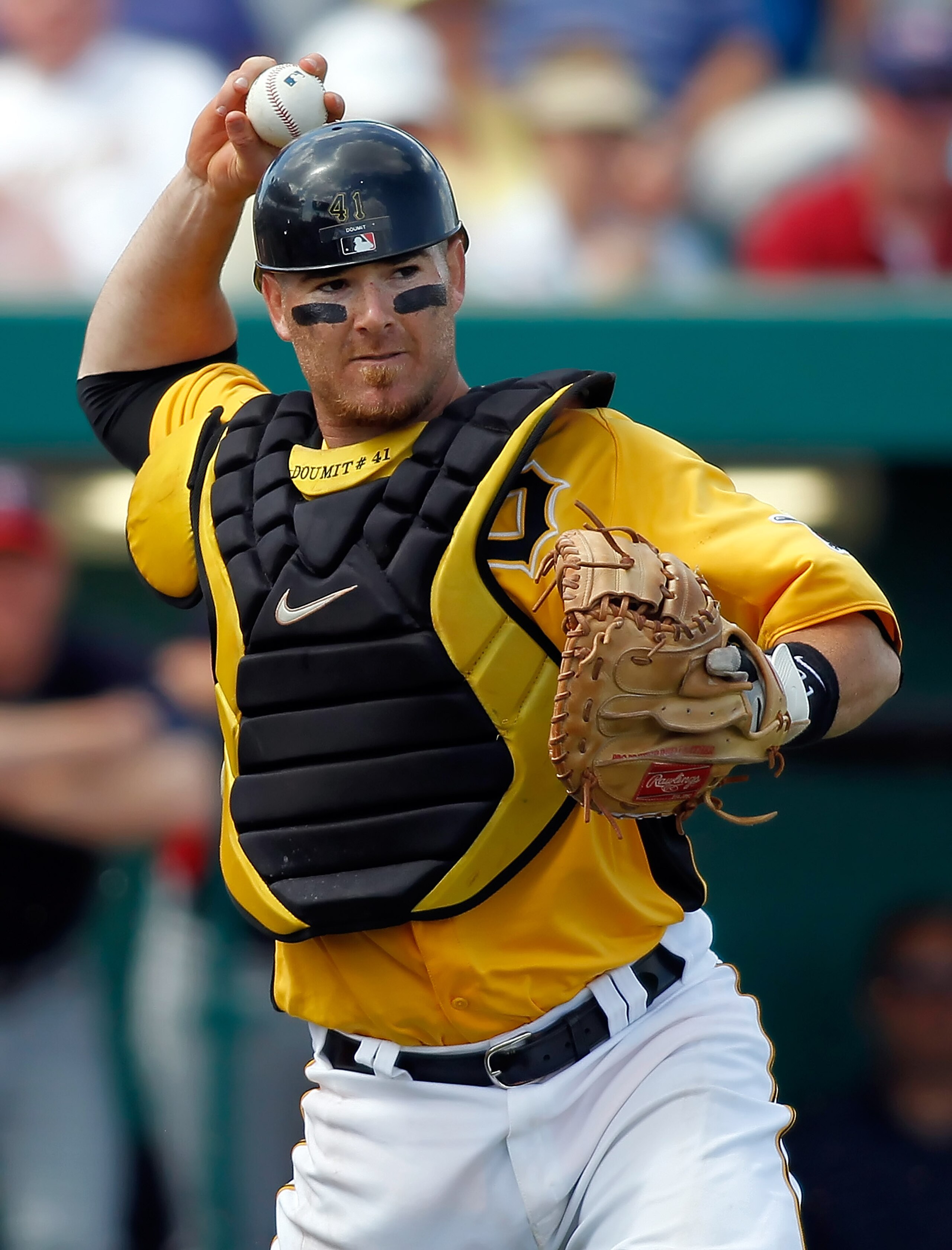 BRADENTON, FL - MARCH 02:  Catcher Ryan Doumit #41 of the Pittsburgh Pirates  throws over to first for an out against the Minnesota Twins during a Grapefruit League Spring Training Game at McKechnie Field on March 2, 2011 in Bradenton, Florida.  (Photo by