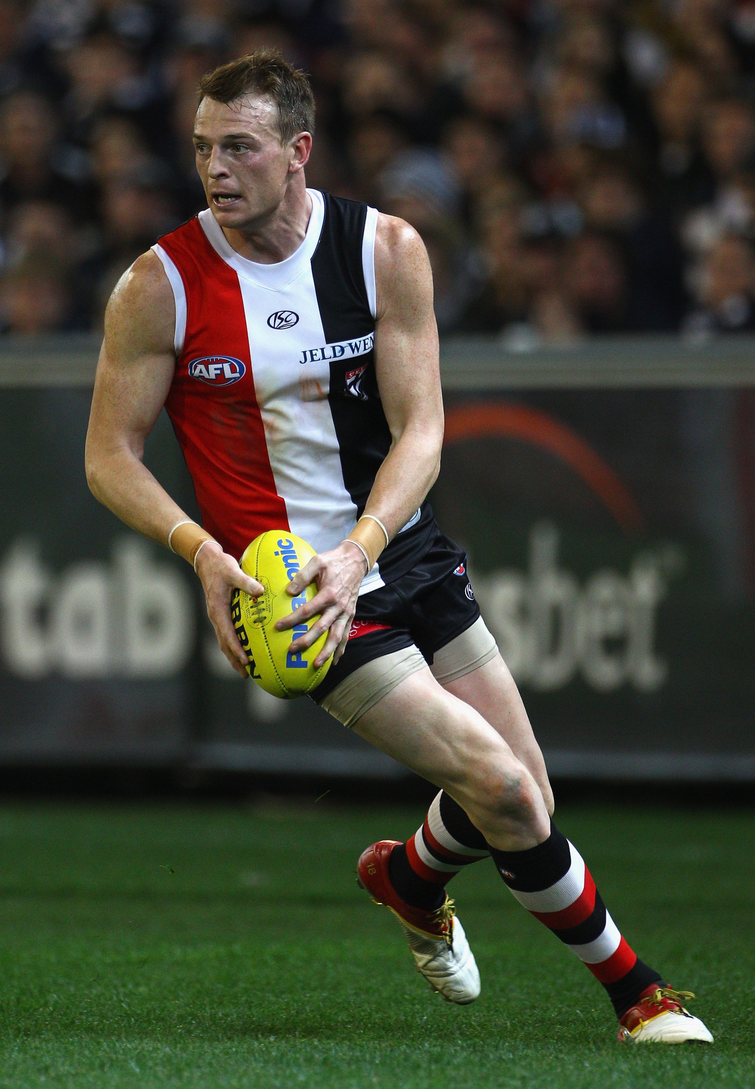 MELBOURNE, AUSTRALIA - SEPTEMBER 03: Brendon Goddard of the Saints looks to pass the ball during the AFL Second Qualifying Final match between the Geelong Cats and the St Kilda Saints at Melbourne Cricket Ground on September 3, 2010 in Melbourne, Austral MELBOURNE, AUSTRALIA - SEPTEMBER 03: Brendon Goddard of the Saints looks to pass the ball during the AFL Second Qualifying Final match between the Geelong Cats and the St Kilda Saints at Melbourne Cricket Ground on September 3, 2010 in Melbourne, Austral