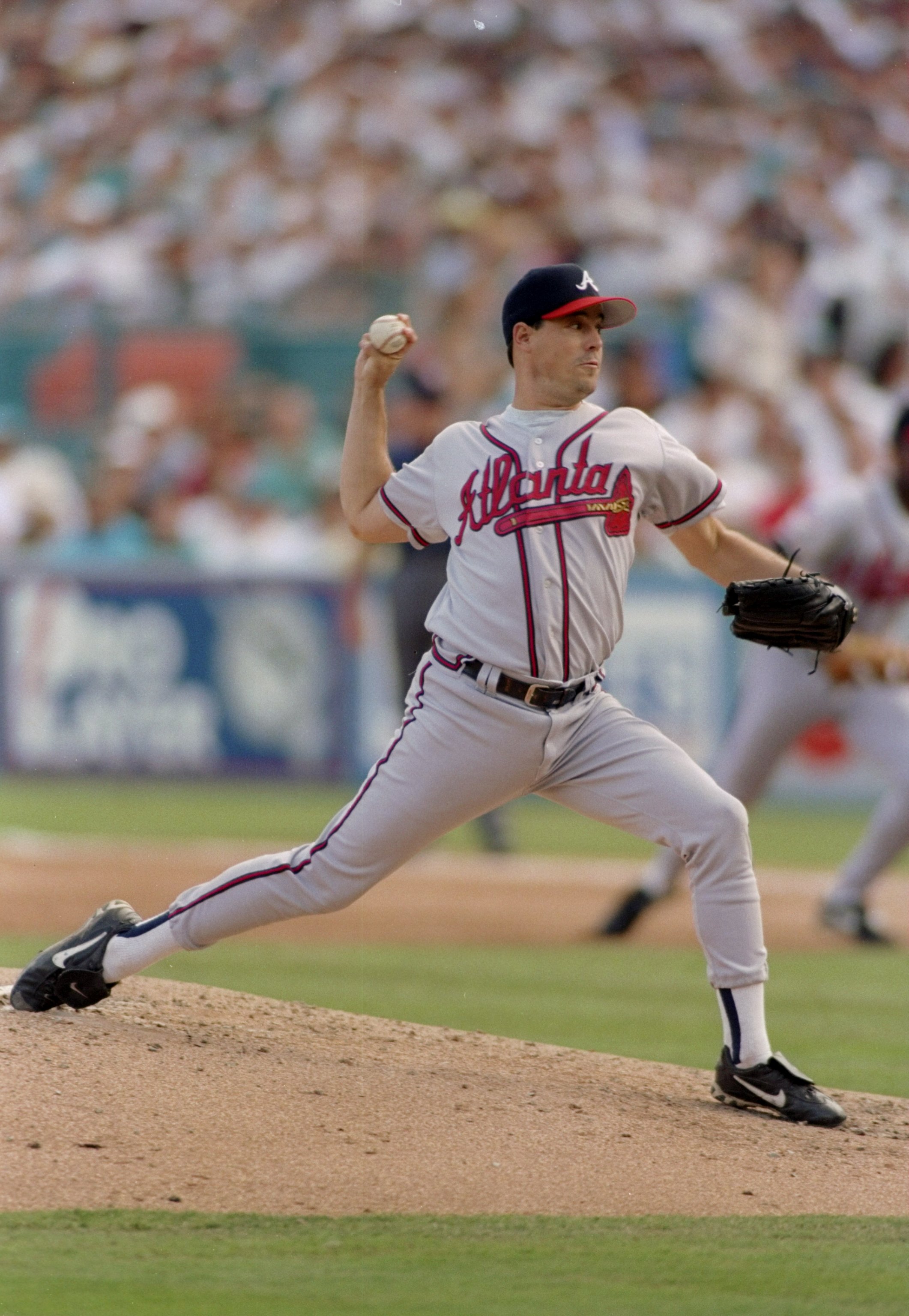 12 Oct 1997: Pitcher Greg Maddux of the Atlanta Braves throws a pitch during game five of the National League Championship Series against the Florida Marlins at Pro Player Park in Miami, Florida. The Marlins won the game 2-1.