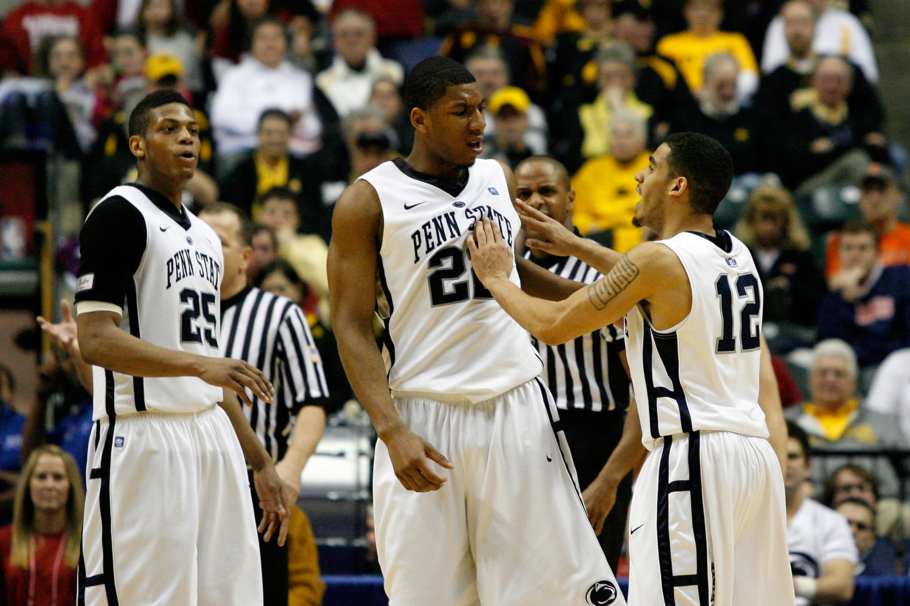 INDIANAPOLIS, IN - MARCH 10: (L-R) Jeff Brooks #25, Andrew Jones #22 and Talor Battle #12 of the Penn State Nittany Lions react against the Indiana Hoosiers during the first round of the 2011 Big Ten Men's Basketball Tournament at Conseco Fieldhouse on M