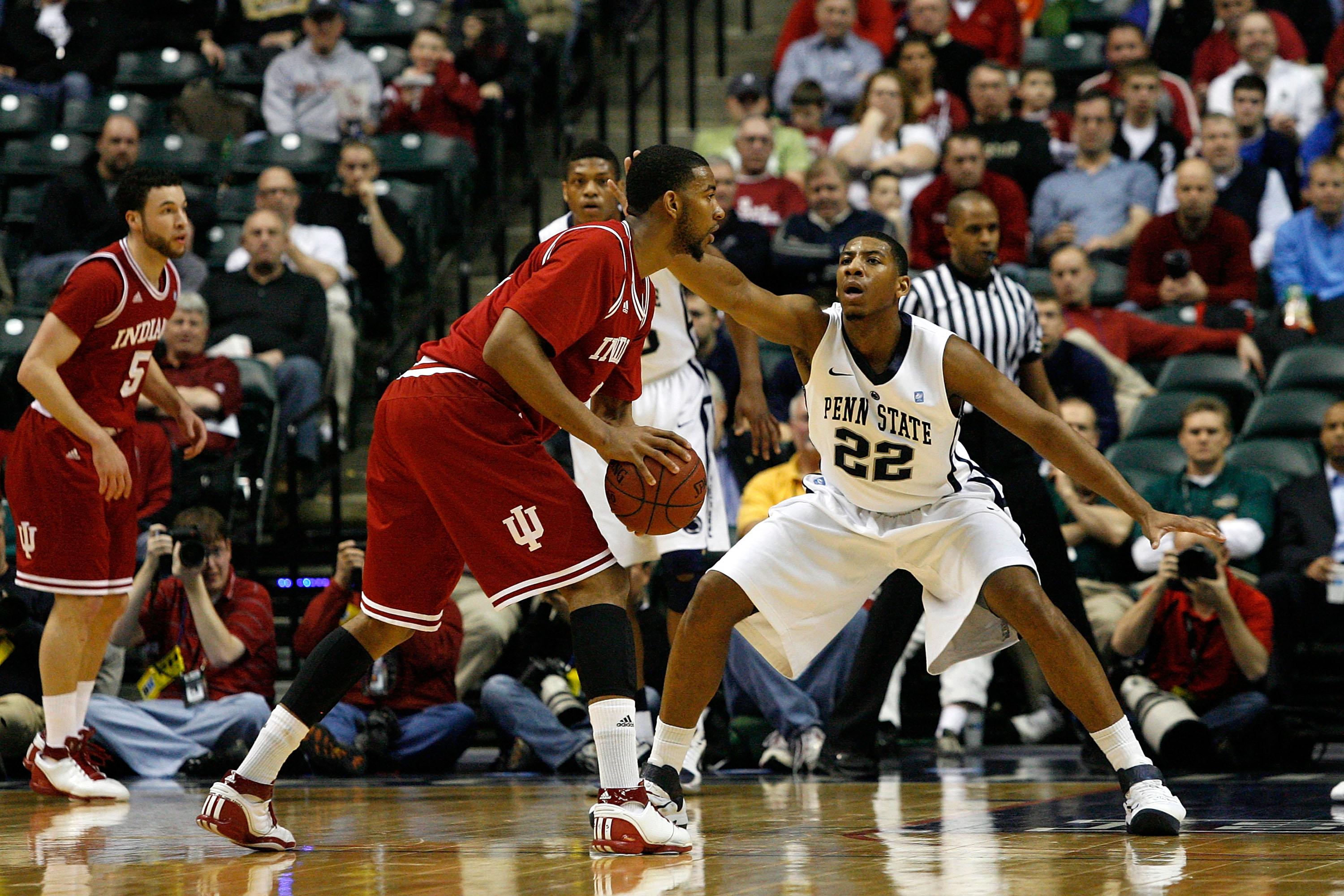 INDIANAPOLIS, IN - MARCH 10: Andrew Jones #22 of the Penn State Nittany Lions defends against Christian Watford #2 of the Indiana Hoosiers during the first round of the 2011 Big Ten Men's Basketball Tournament at Conseco Fieldhouse on March 10, 2011 in I