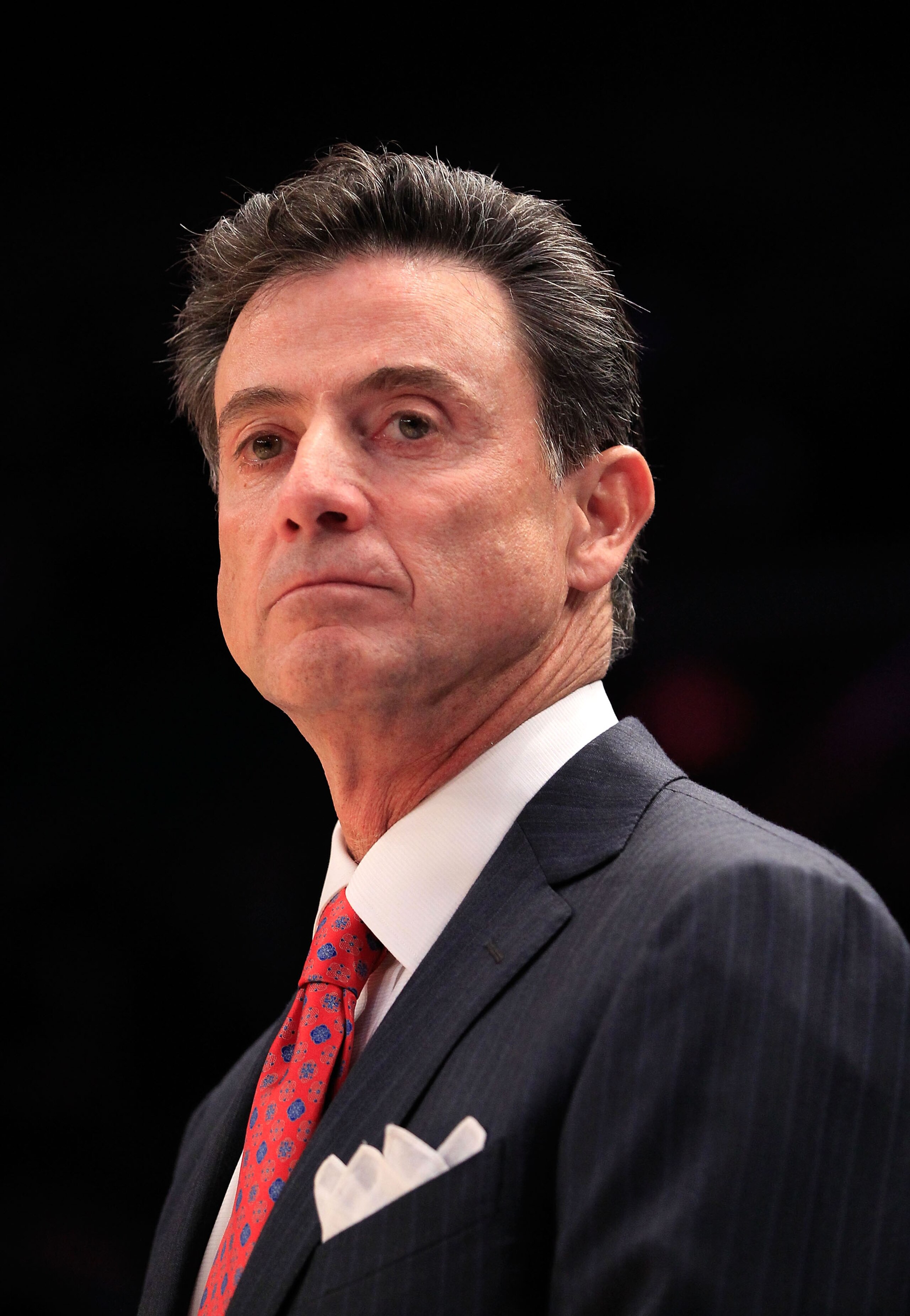 NEW YORK, NY - MARCH 10: Head coach Rick Pitino of the Louisville Cardinals looks on from the bench during the game against the Marquette Golden Eagles during the quarterfinals of the 2011 Big East Men's Basketball Tournament presented by American Eagle O