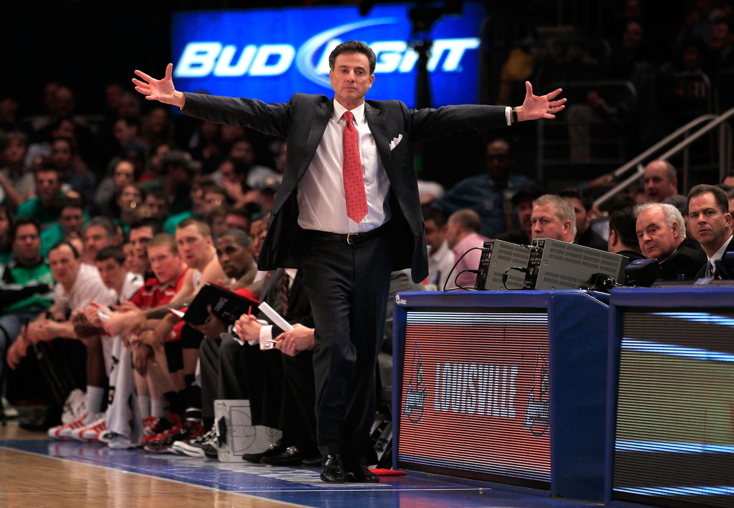 NEW YORK, NY - MARCH 10: Head coach Rick Pitino of the Louisville Cardinals gestures from the bench during the game against the Marquette Golden Eagles during the quarterfinals of the 2011 Big East Men's Basketball Tournament presented by American Eagle O