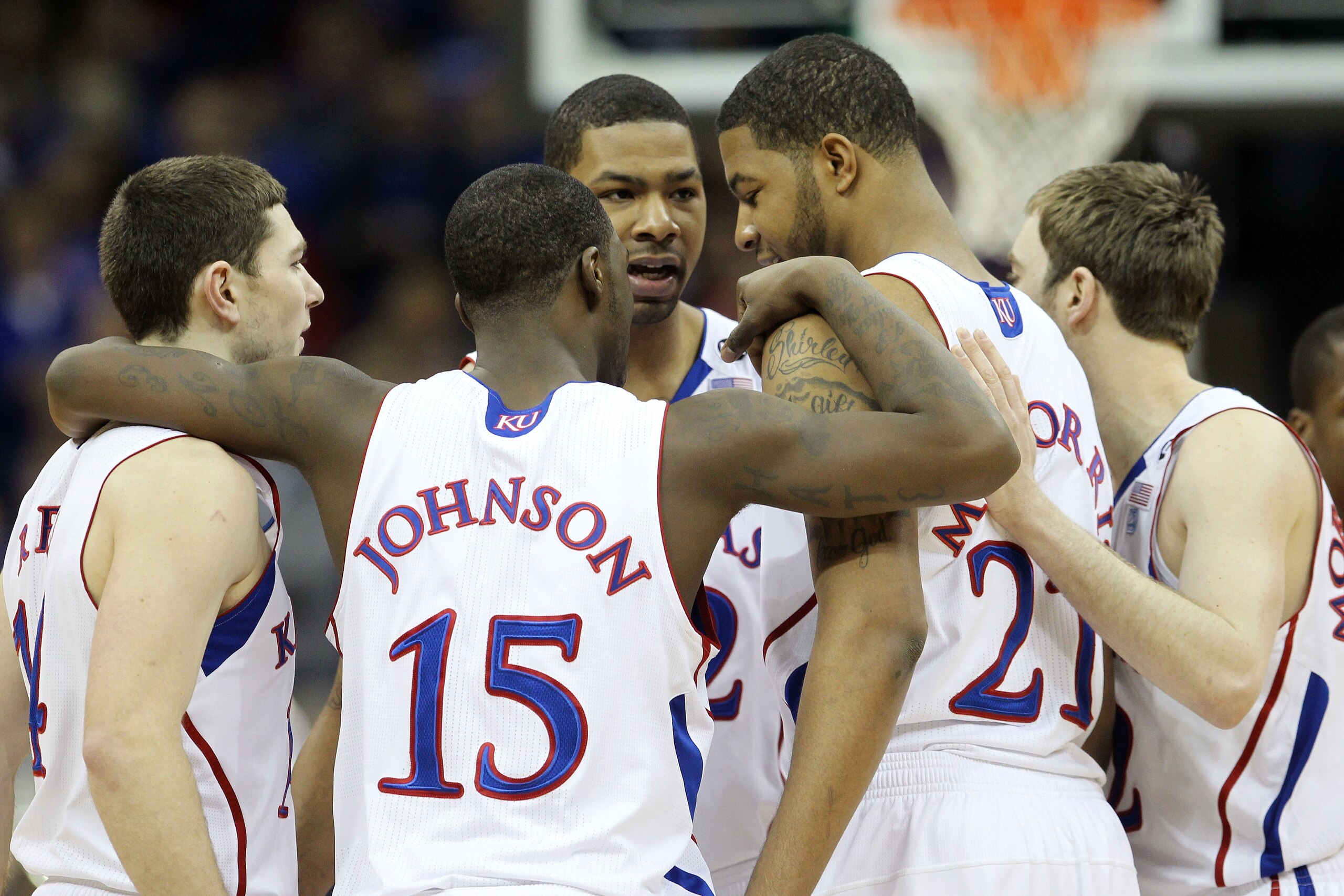KANSAS CITY, MO - MARCH 10:  The Kansas Jayhawks huddle together during their quarterfinal game against the Oklahoma State Cowboys in the 2011 Phillips 66 Big 12 Men's Basketball Tournament at Sprint Center on March 10, 2011 in Kansas City, Missouri.  (Ph