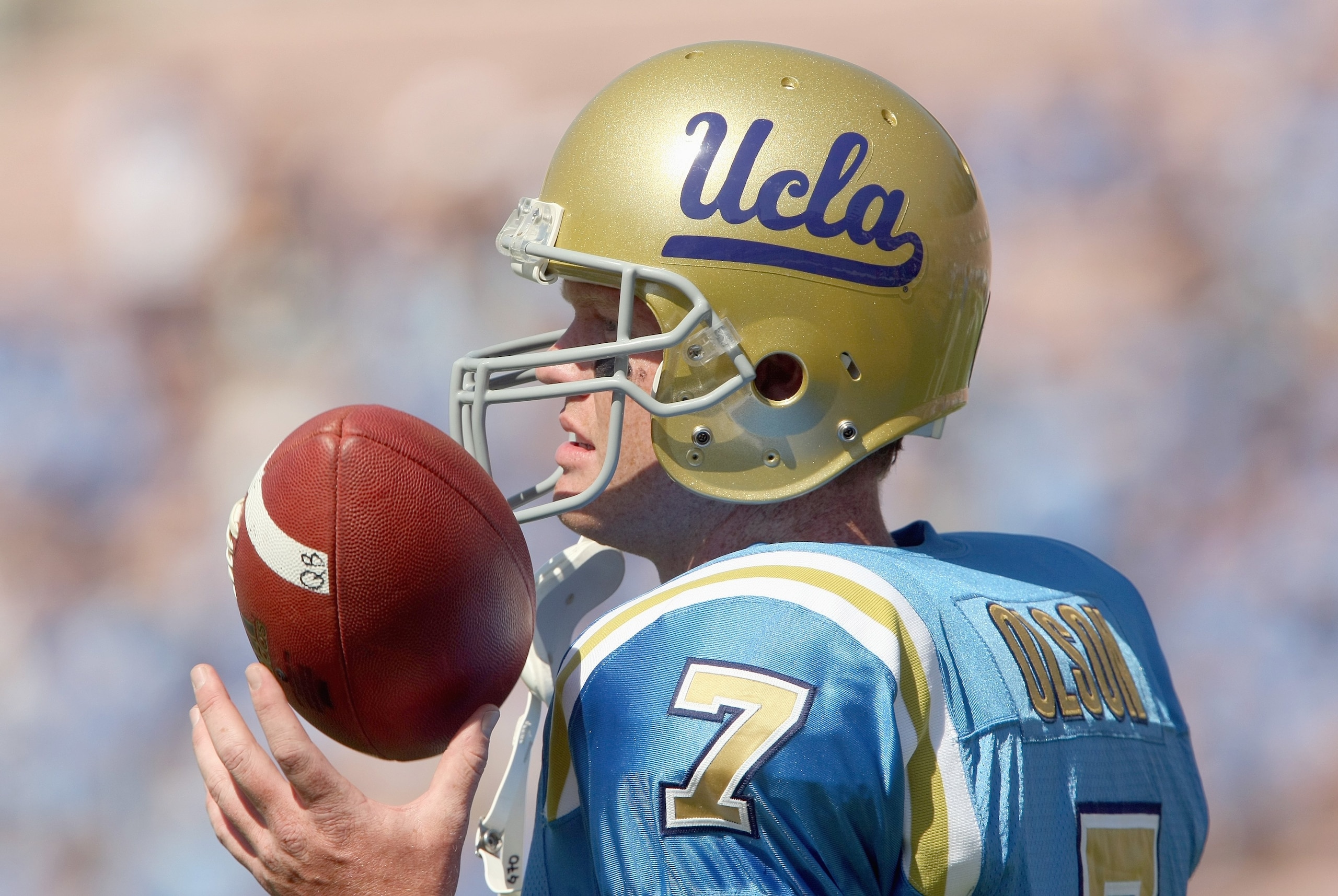 PASADENA, CA - SEPTEMBER 8: Quarterback Ben Olson #7 of the UCLA Bruins tosses the ball against the BYU Cougars on September 8, 2007 at the Rose Bowl in Pasadena, California. UCLA won 27-17. (Stephen Dunn/Getty Images)