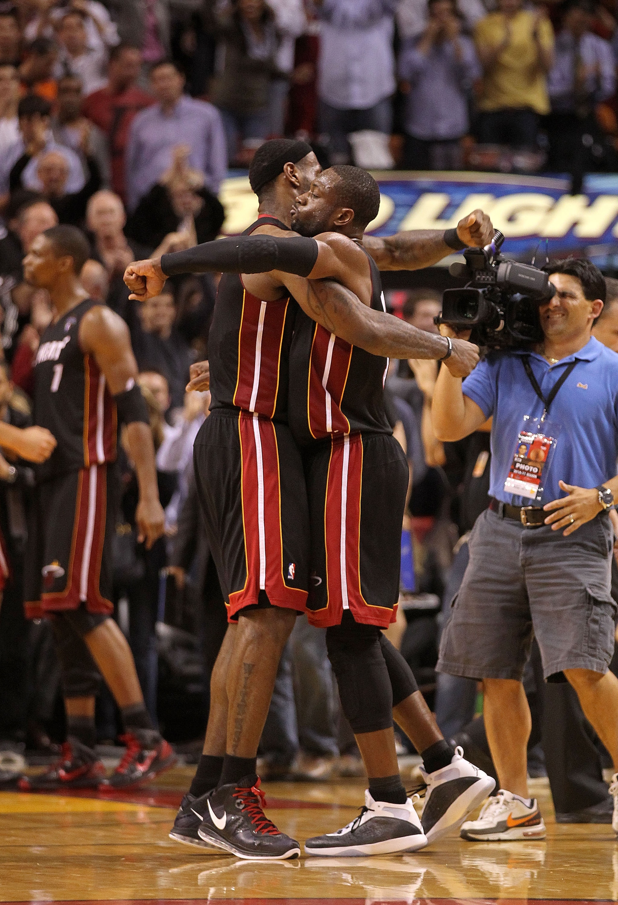 MIAMI, FL - MARCH 10:  Dwyane Wade #3 and LeBron James #6 of the Miami Heat hug after winning a game against  the Los Angeles Lakers at American Airlines Arena on March 10, 2011 in Miami, Florida. NOTE TO USER: User expressly acknowledges and agrees that,