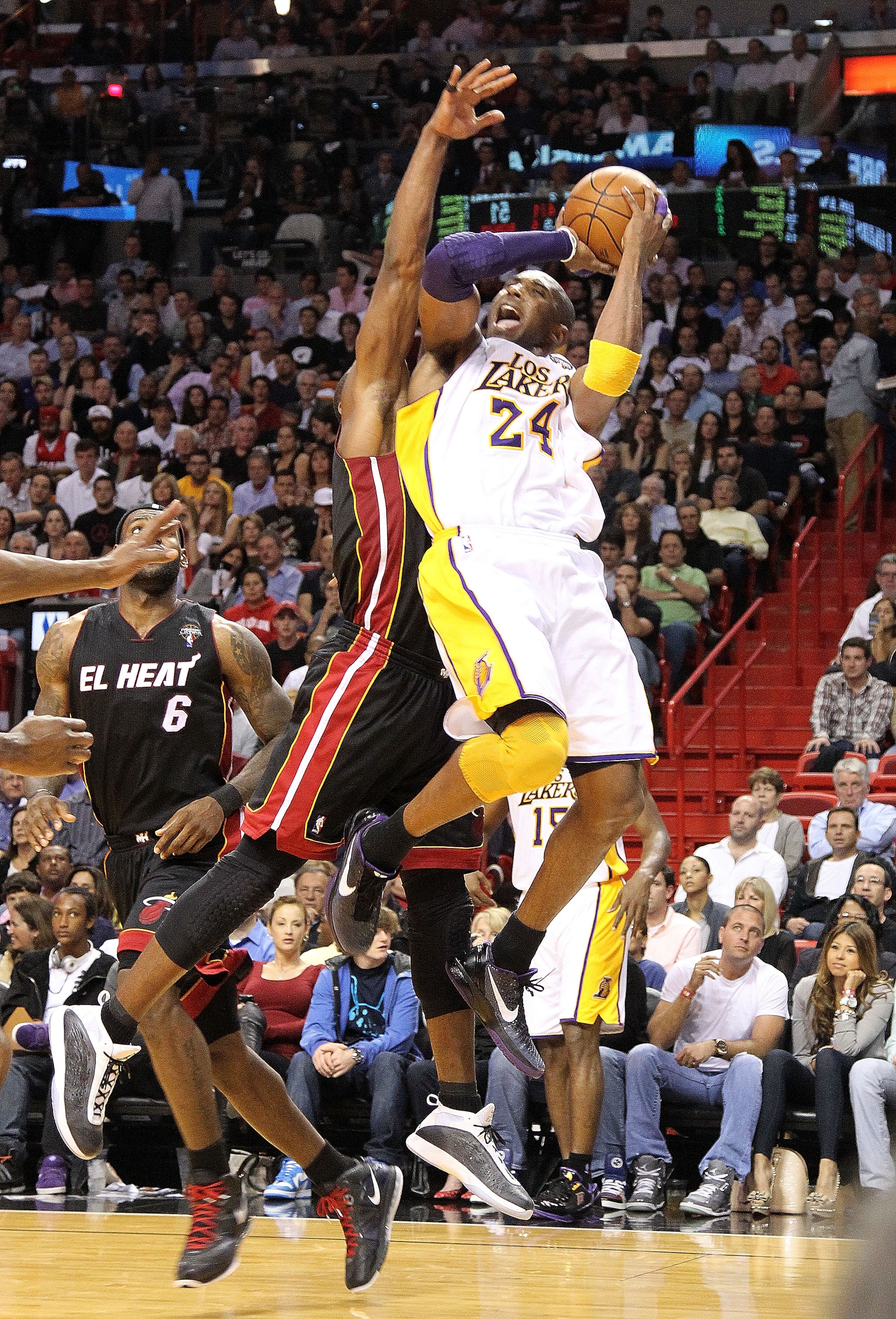 MIAMI, FL - MARCH 10: Kobe Bryant #24 of the Los Angeles Lakers takes a shot during a game against the Miami Heat at American Airlines Arena on March 10, 2011 in Miami, Florida. NOTE TO USER: User expressly acknowledges and agrees that, by downloading and