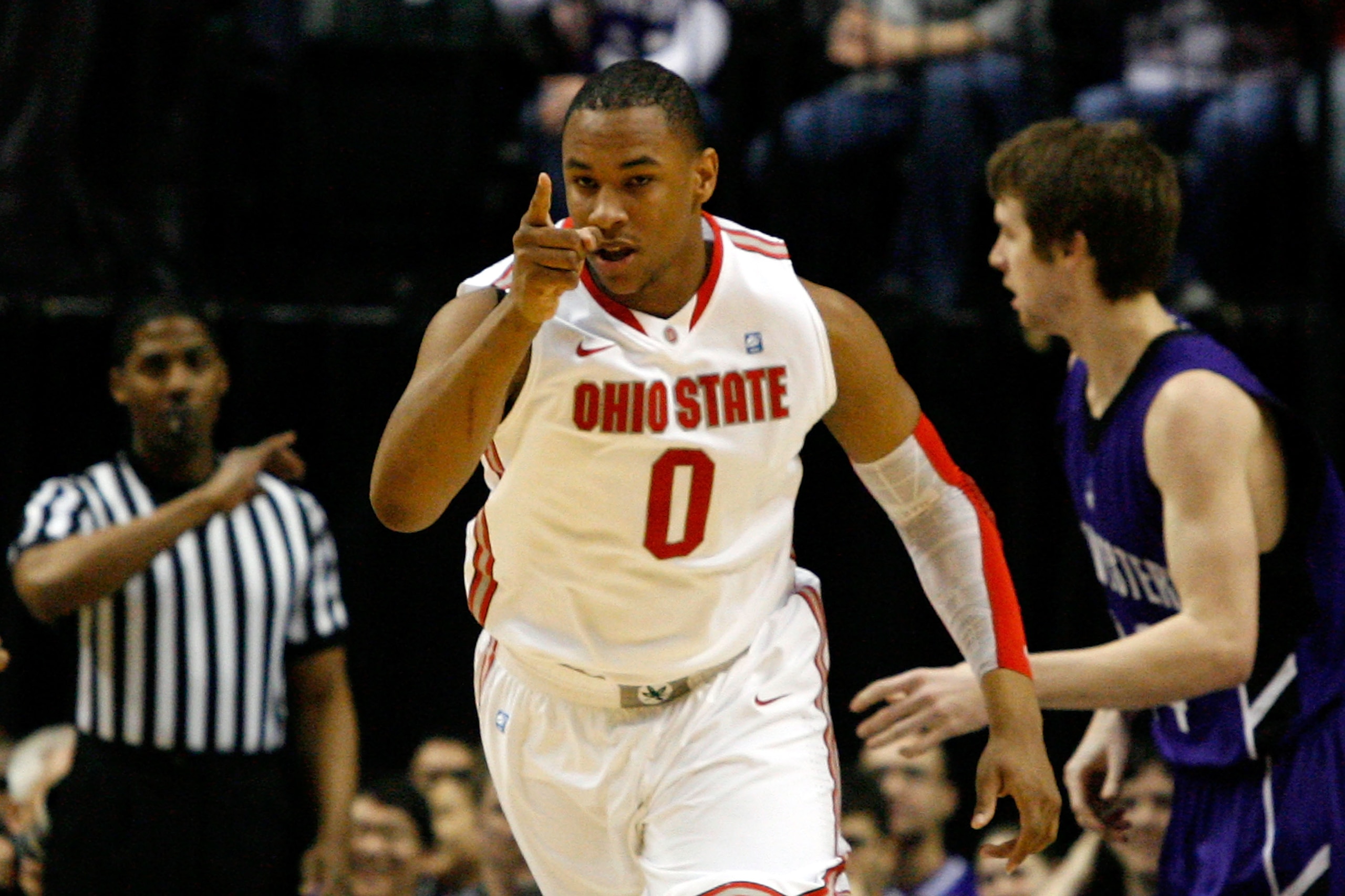 INDIANAPOLIS, IN - MARCH 11:  Jared Sullinger #0 of the Ohio State Buckeyes reacts after he made a first half basket against during the quarterfinals of the 2011 Big Ten Men's Basketball Tournament at Conseco Fieldhouse on March 11, 2011 in Indianapolis,