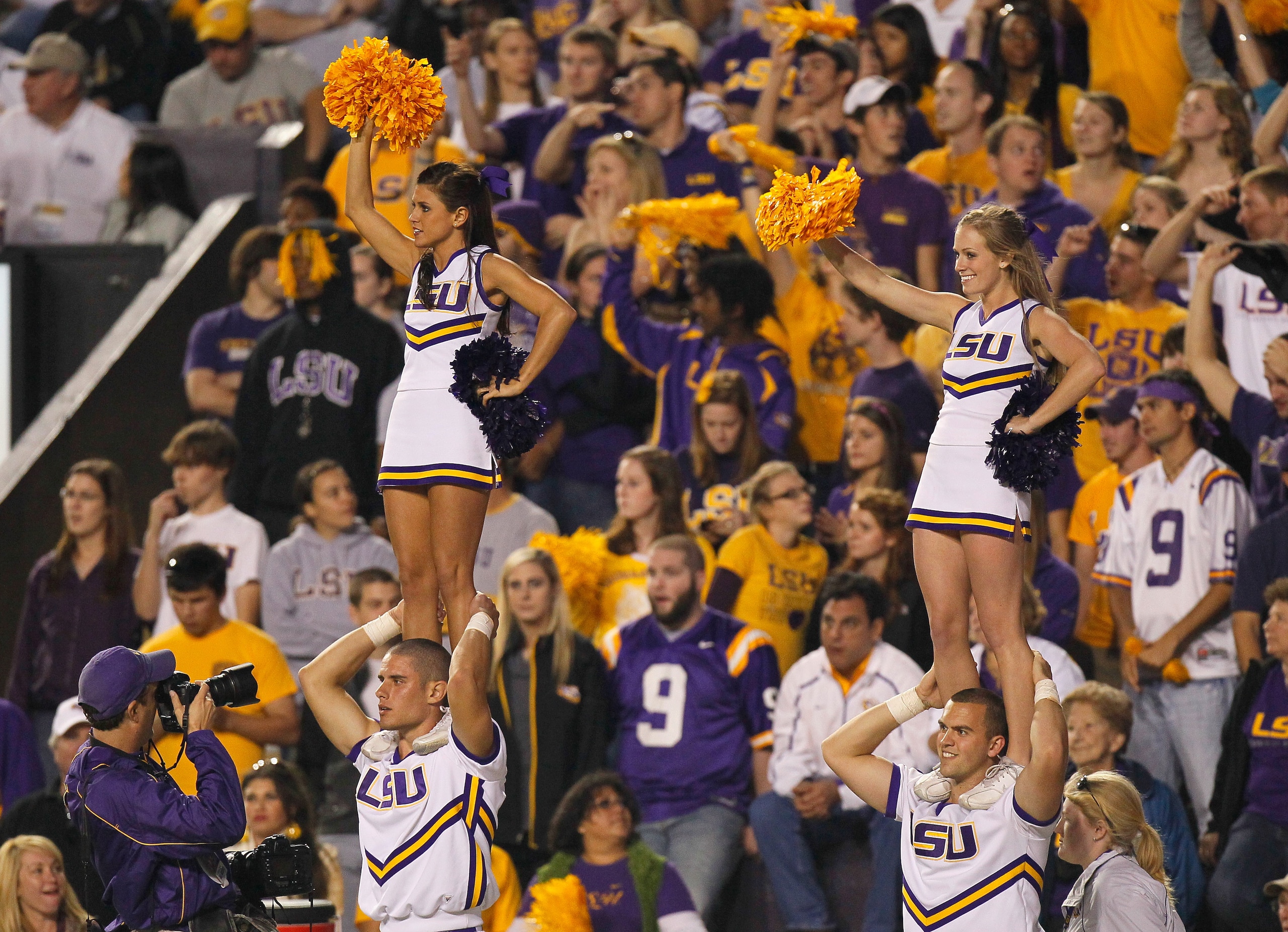 BATON ROUGE, LA - NOVEMBER 20:  Cheerleaders of the Louisiana State University Tigers cheer against the Ole Miss Rebels at Tiger Stadium on November 20, 2010 in Baton Rouge, Louisiana.  (Photo by Kevin C. Cox/Getty Images)