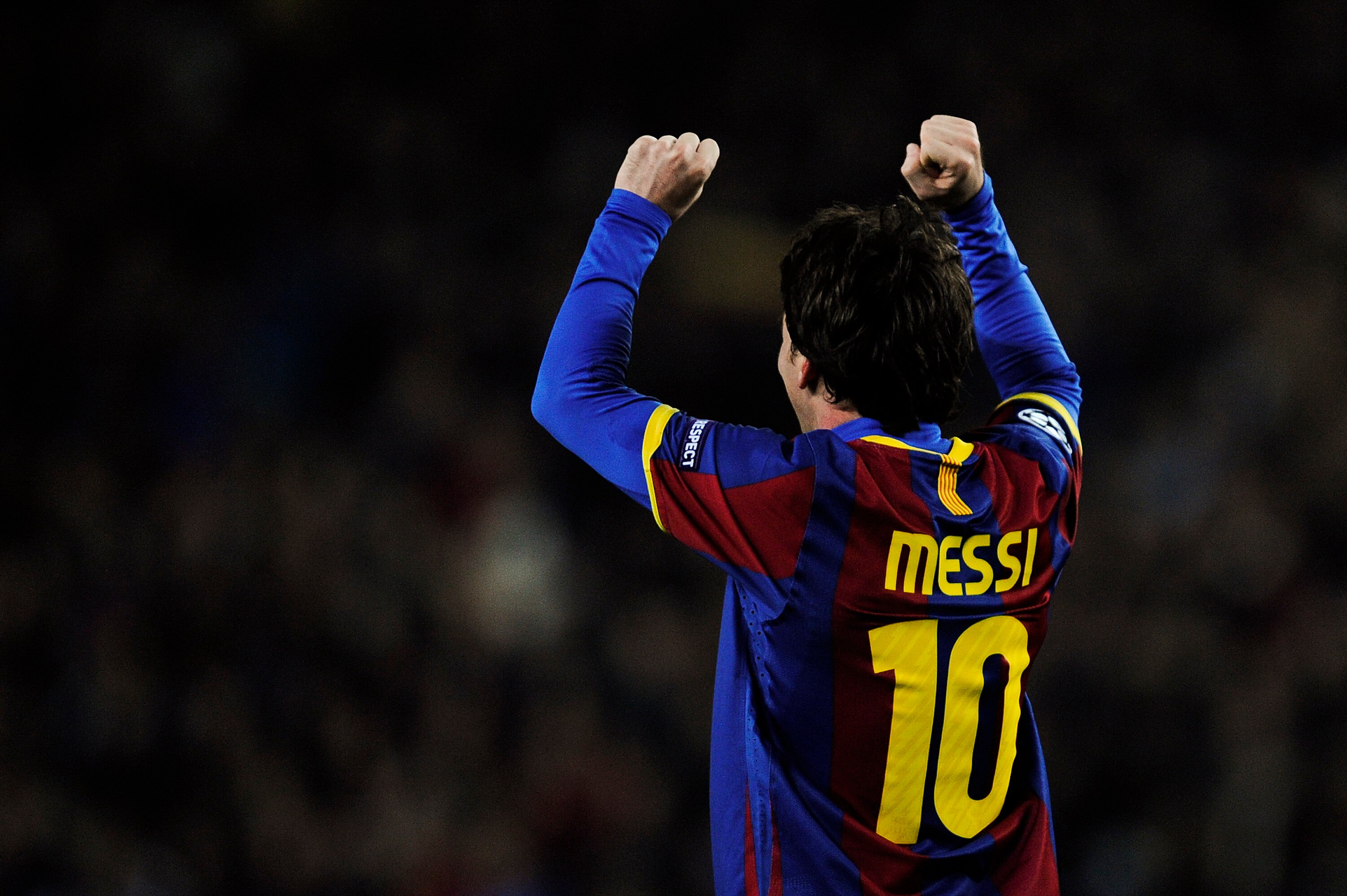 BARCELONA, SPAIN - MARCH 08:  Lionel Messi of FC Barcelona celebrates after scoring his second goal during the UEFA Champions League round of 16 second leg match between Barcelona and Arsenal at the Camp Nou stadium on March 8, 2011 in Barcelona, Spain.