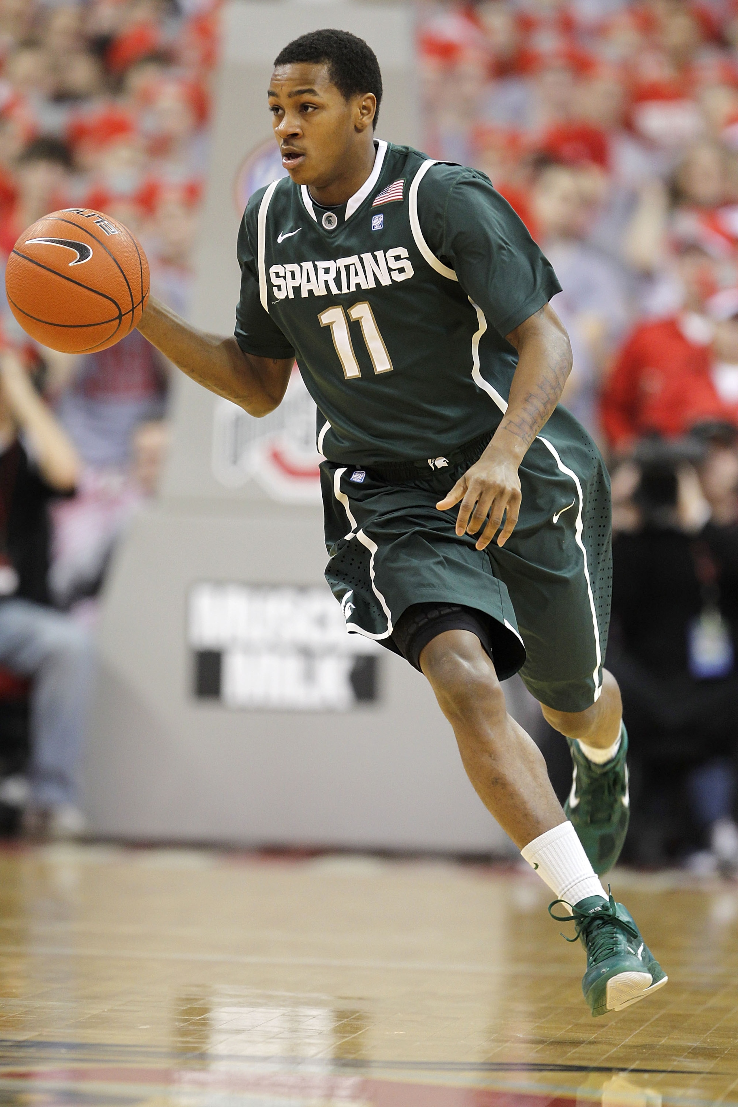 COLUMBUS, OH - FEBRUARY 15: Keith Appling #11 of the Michigan State Spartans dribbles the ball up court during the first half against the Ohio State Buckeyes on February 15, 2011 at Value City Arena in Columbus, Ohio.  (Photo by Gregory Shamus/Getty Image