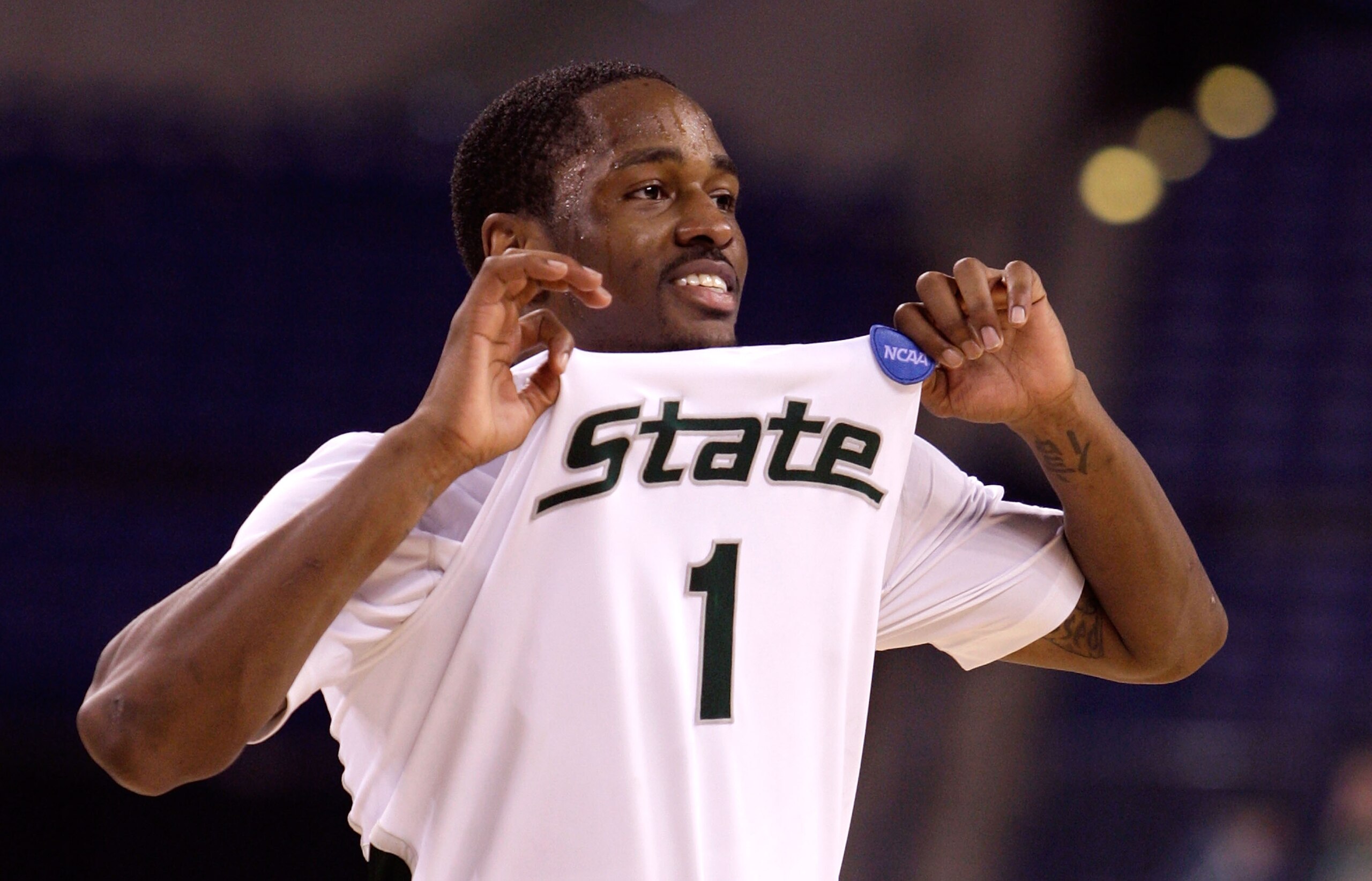 INDIANAPOLIS - MARCH 27:  Kalin Lucas #1 of the Michigan State Spartans celebrates as he runs off the court after Michigan State's 67-62 win against the Kansas Jayhawks during the third round of the NCAA Division I Men's Basketball Tournament at the Lucas
